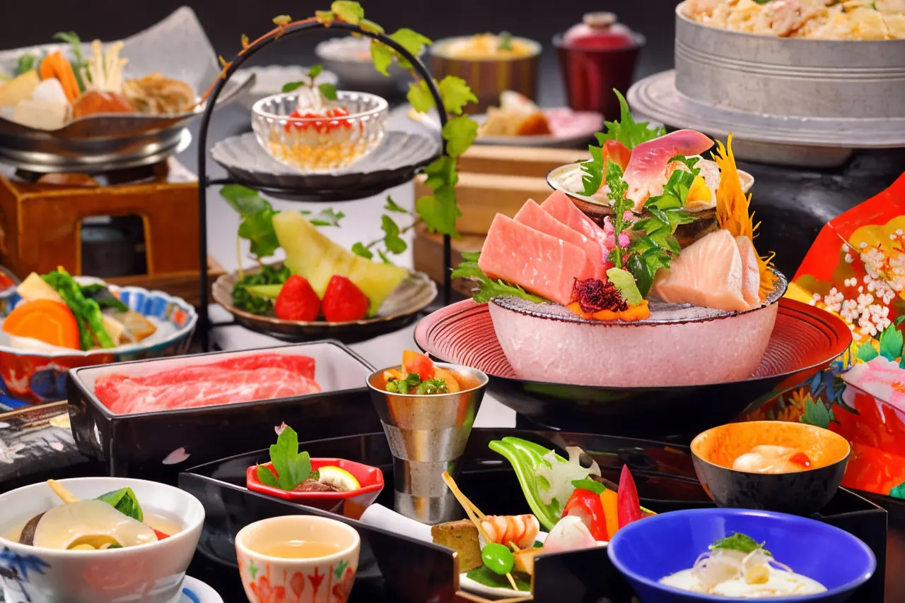 Multi-course Japanese kaiseki dinner spread with sashimi and small dishes