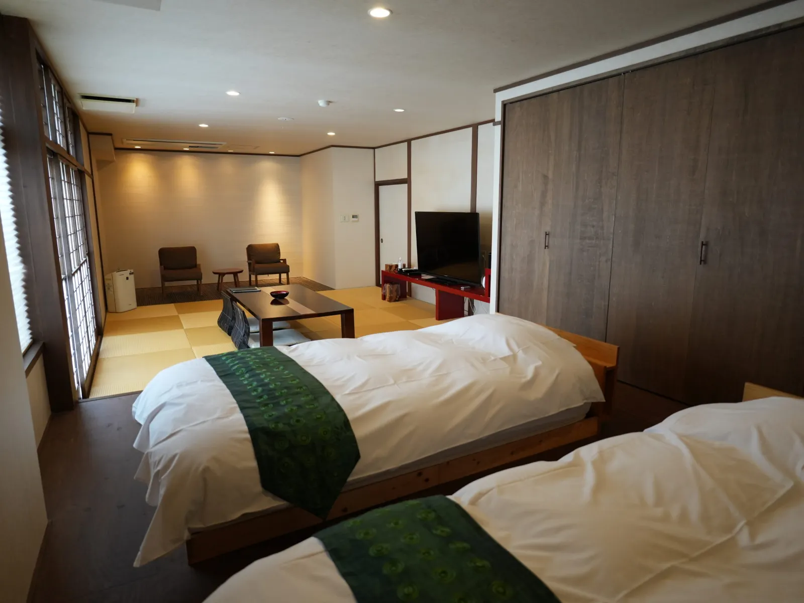 Twin room with a tatami sitting area