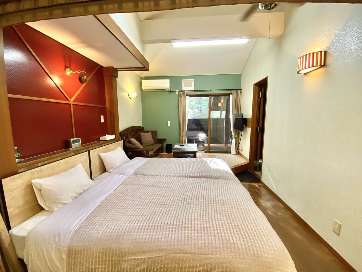 Spacious double room with wooden accents