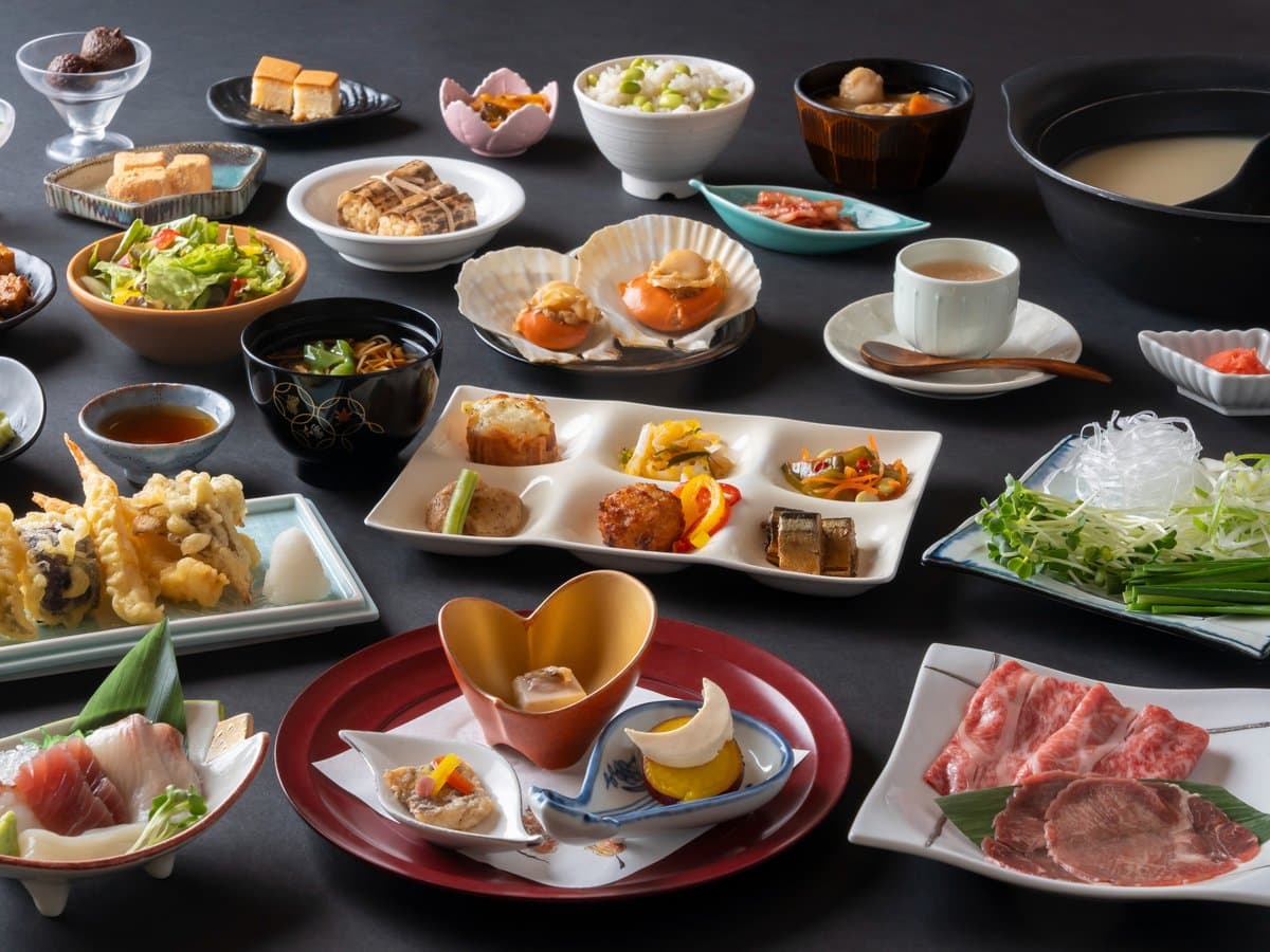 Multi-course kaiseki dinner spread with wagyu beef, sashimi, tempura and assorted small dishes, Yumoto Kissho, Naruko Onsen