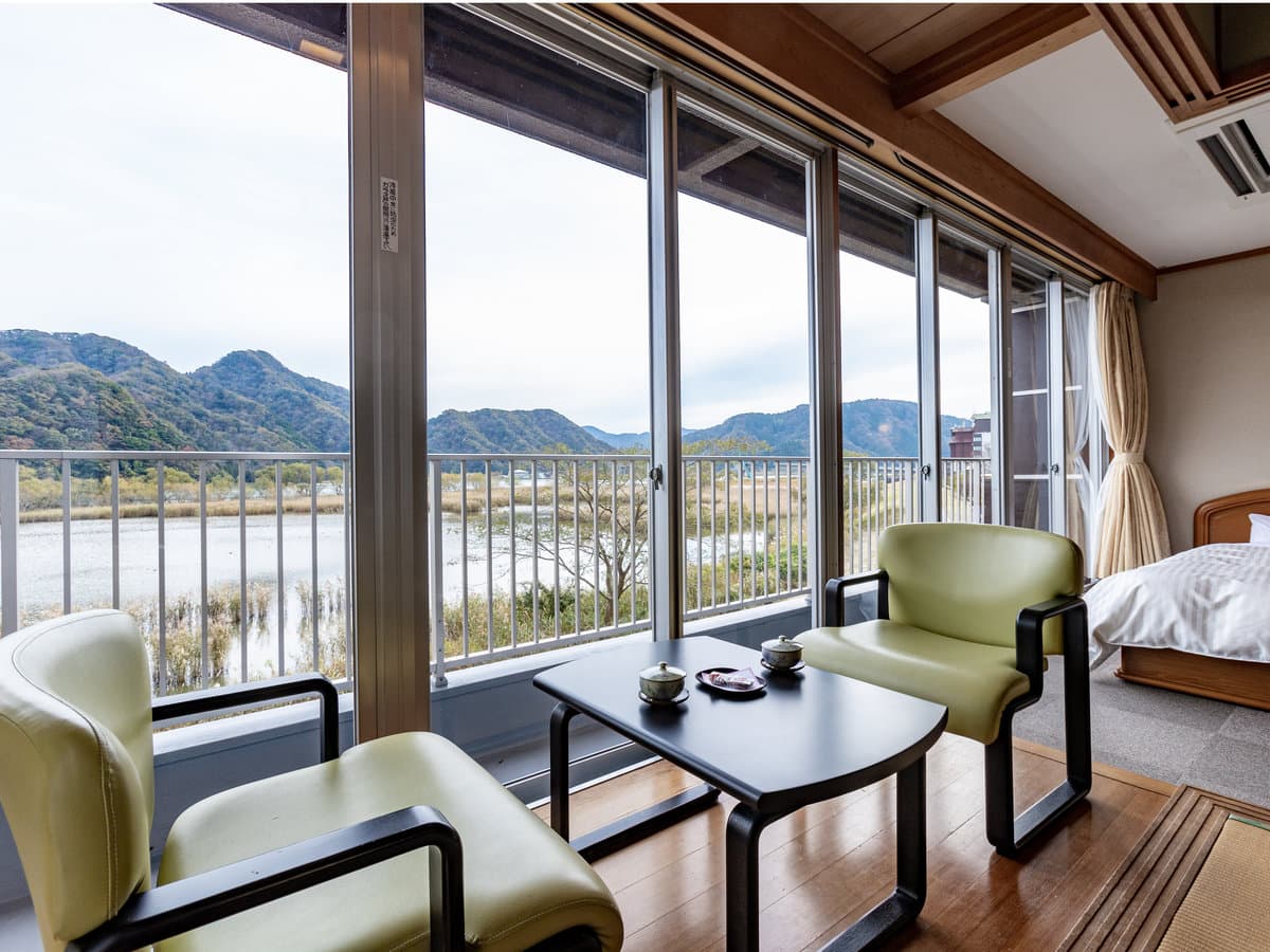 Tatami guest room at Oyado Seri overlooking the Otani River