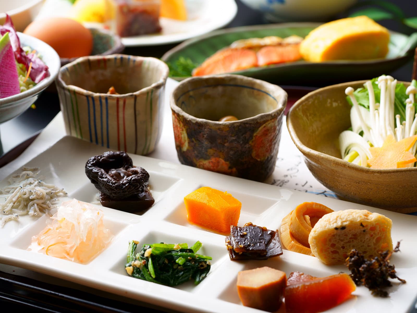 Japanese breakfast set at Hozantei with grilled fish, tofu hot pot and assorted small dishes