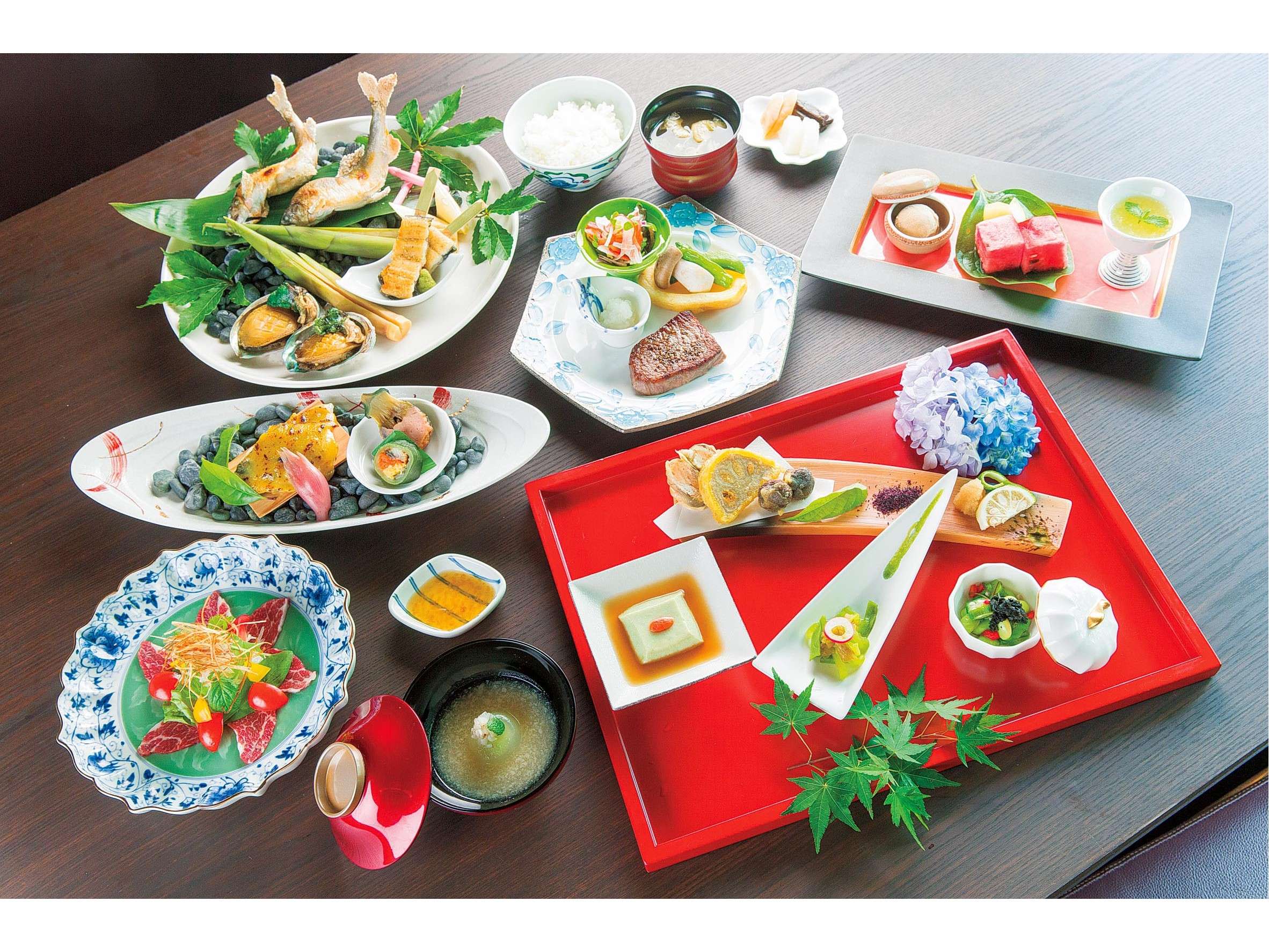 Multi-course seasonal kaiseki dinner spread served at Miyama Sansou