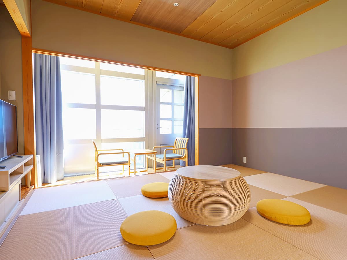 Bright Japanese-style tatami guest room with low table and floor cushions at TAOYA Nikko Kirifuri