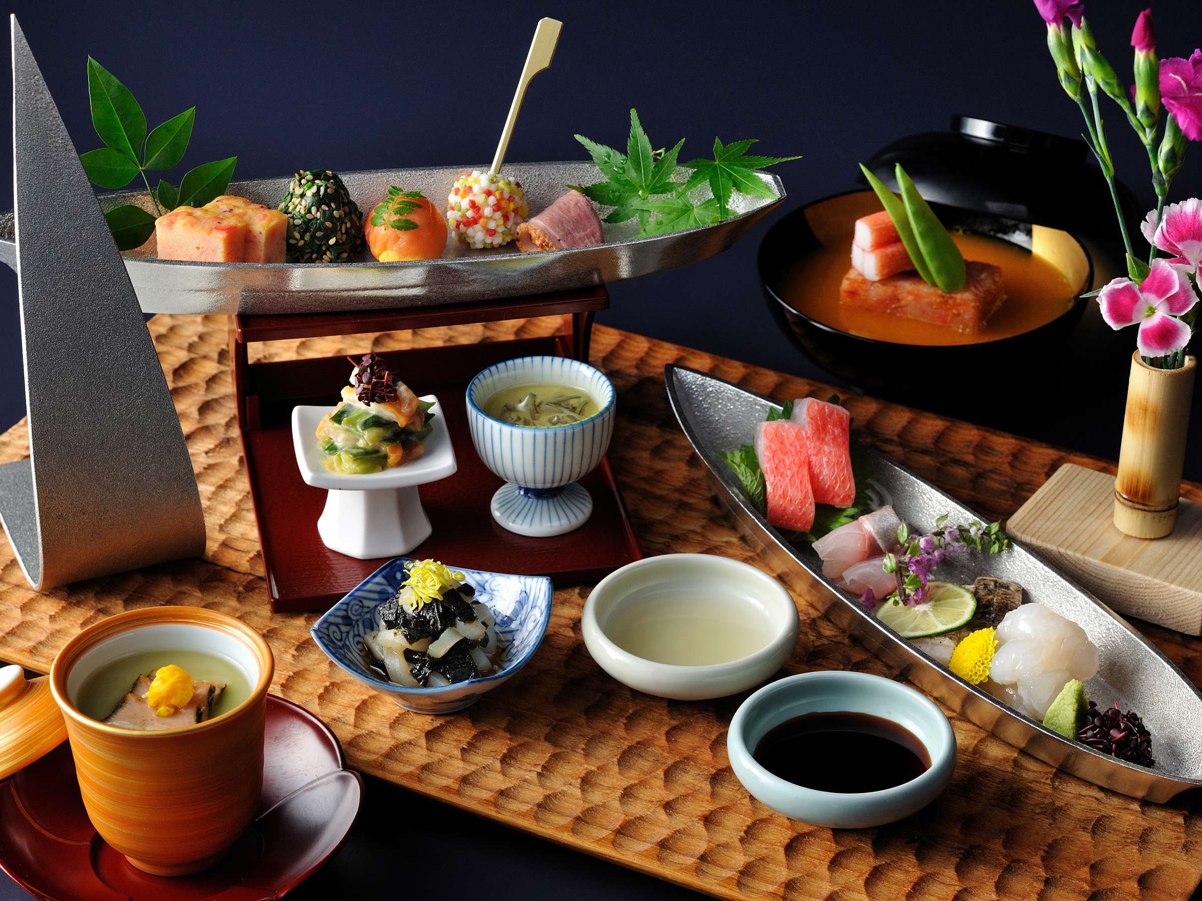 Multi-course Japanese kaiseki dinner of sashimi, appetizers and seasonal dishes at Risonare Atami