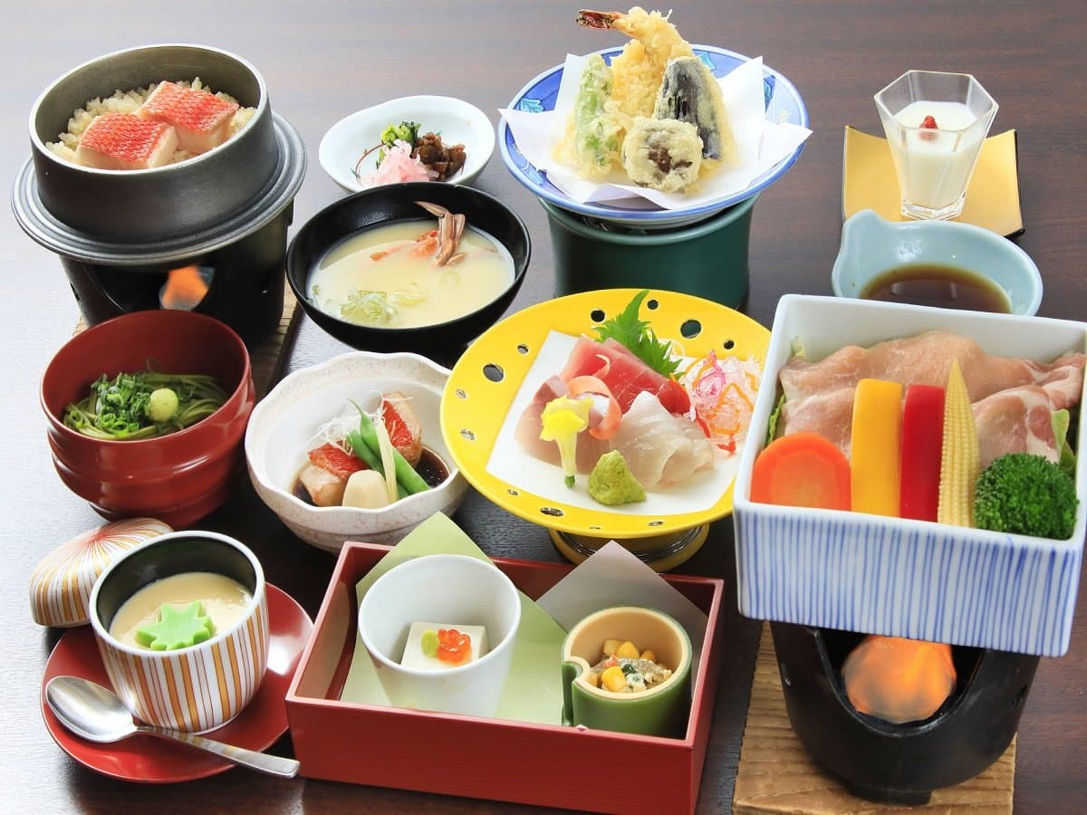 Multi-course Japanese kaiseki dinner with kinmedai rice, sashimi, tempura and small dishes at Hotel Dankoen, Izu