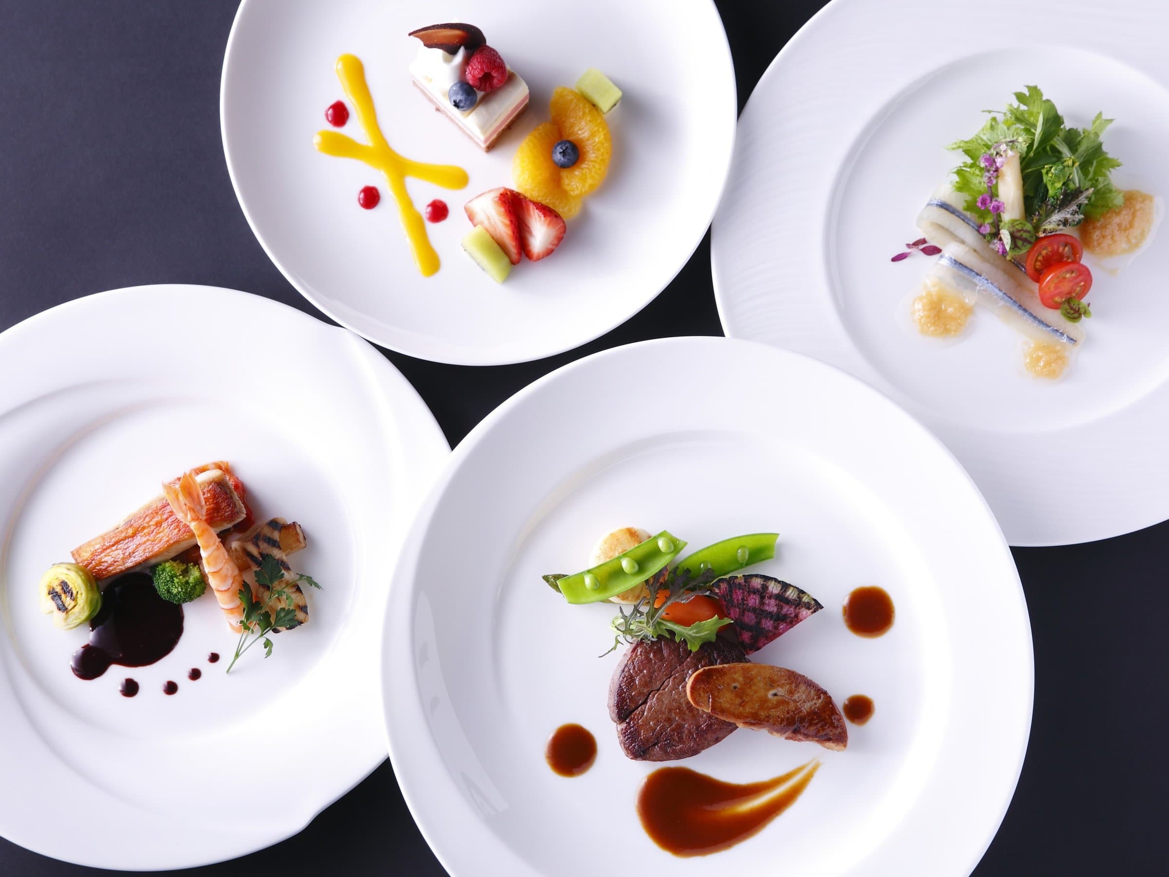 French course main dish of seared beef with red wine sauce and spring vegetables at Nara Hotel