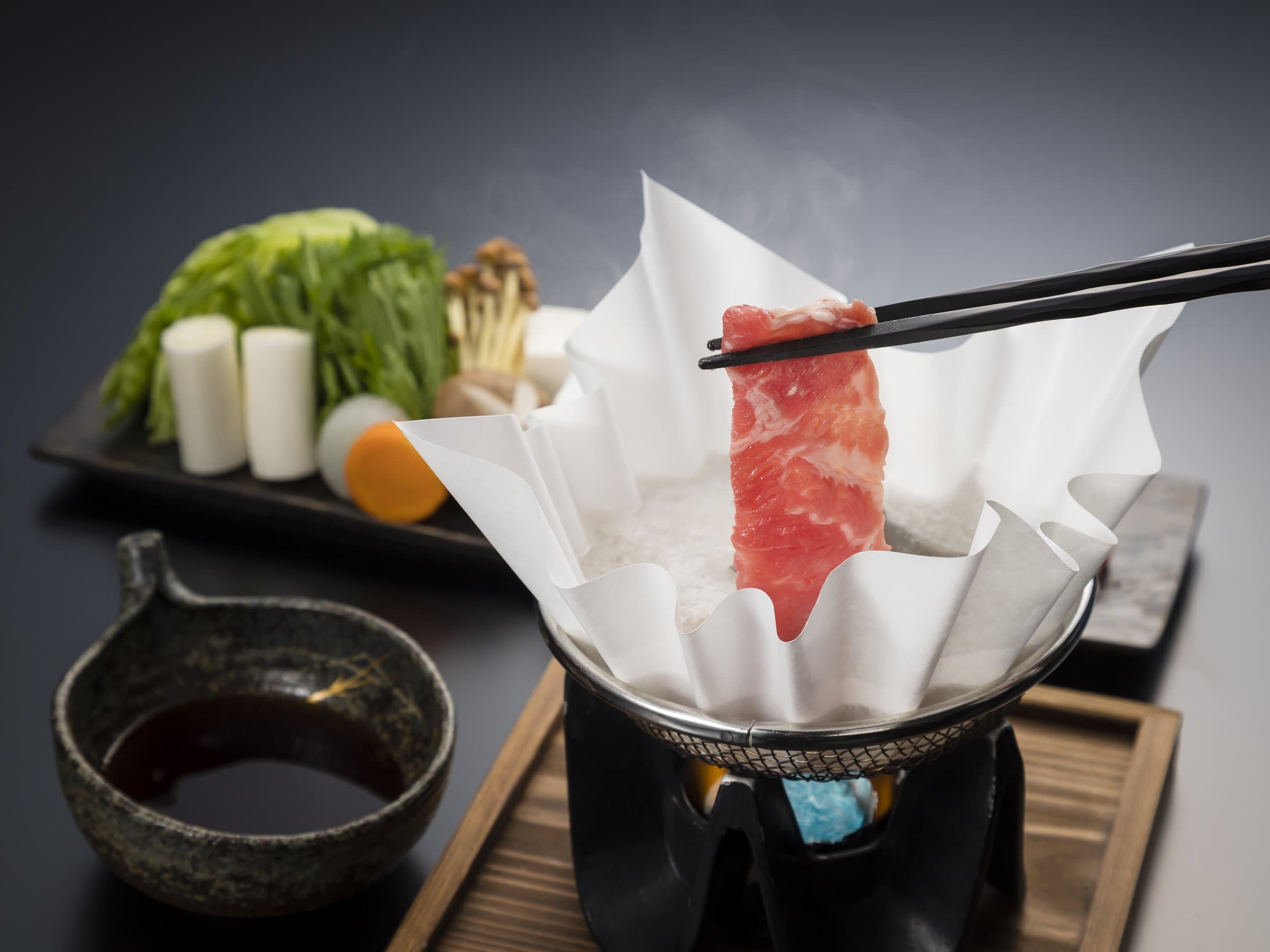 Wagyu beef shabu-shabu course with fresh vegetables and dipping sauce served at Wakatake no Sho ryokan, Kinugawa Onsen