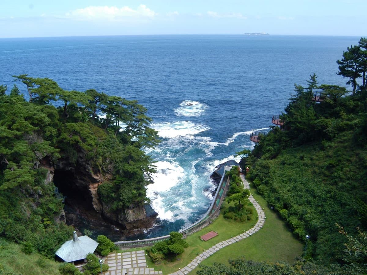 Nishikizaki coastal garden with pines and cliffside paths over Sagami Bay at Hotel New Akao, Atami