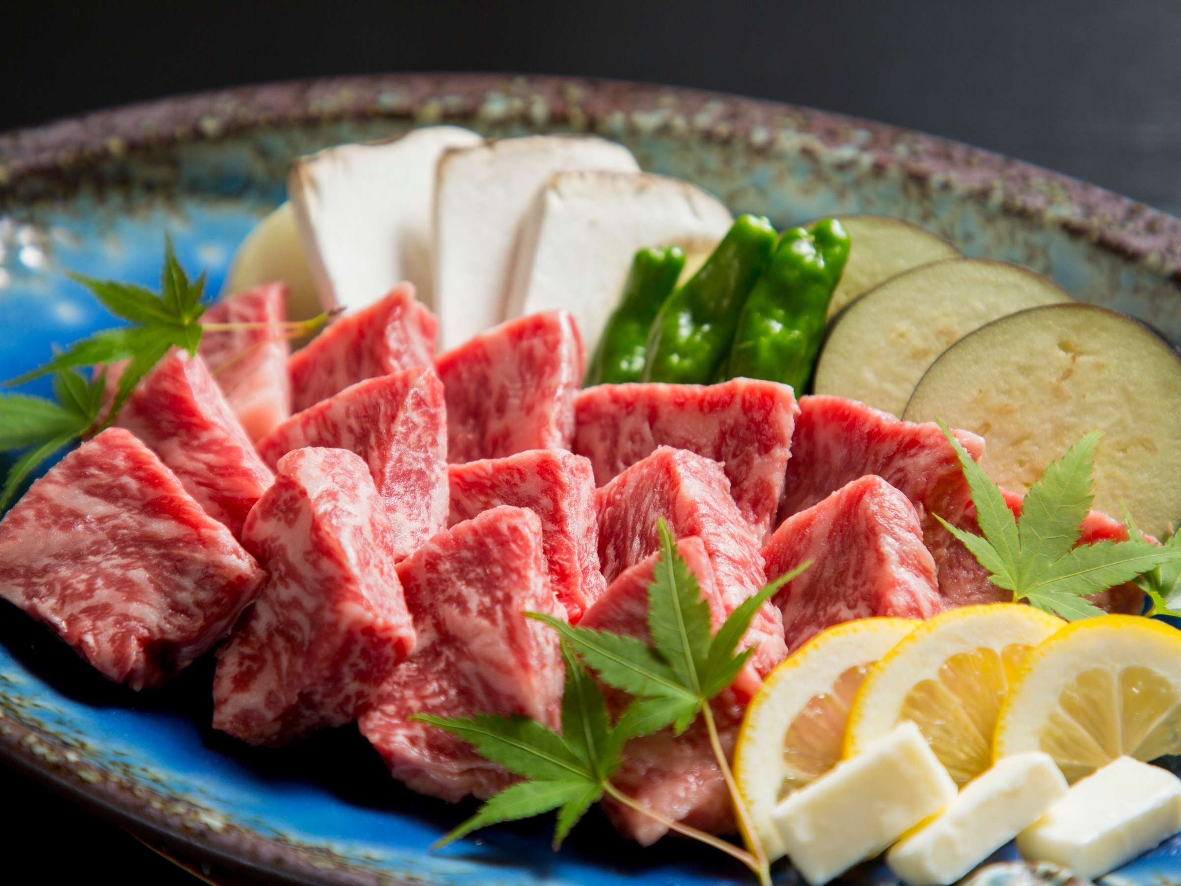 Yumerindo Kumamoto Aka-ushi beef yakiniku platter with mushrooms and vegetables
