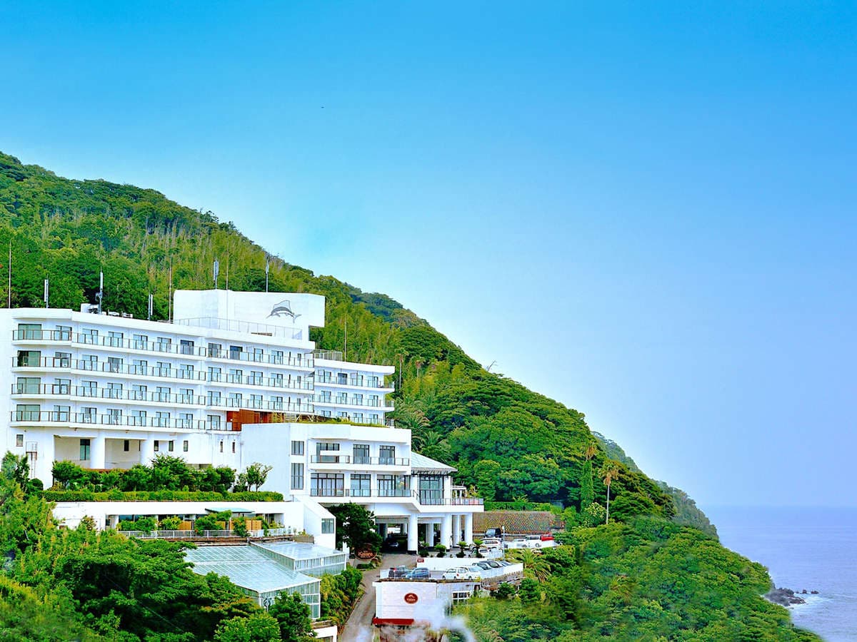Hotel Katara Resort & Spa white hilltop building overlooking the sea at Atagawa Onsen, Izu