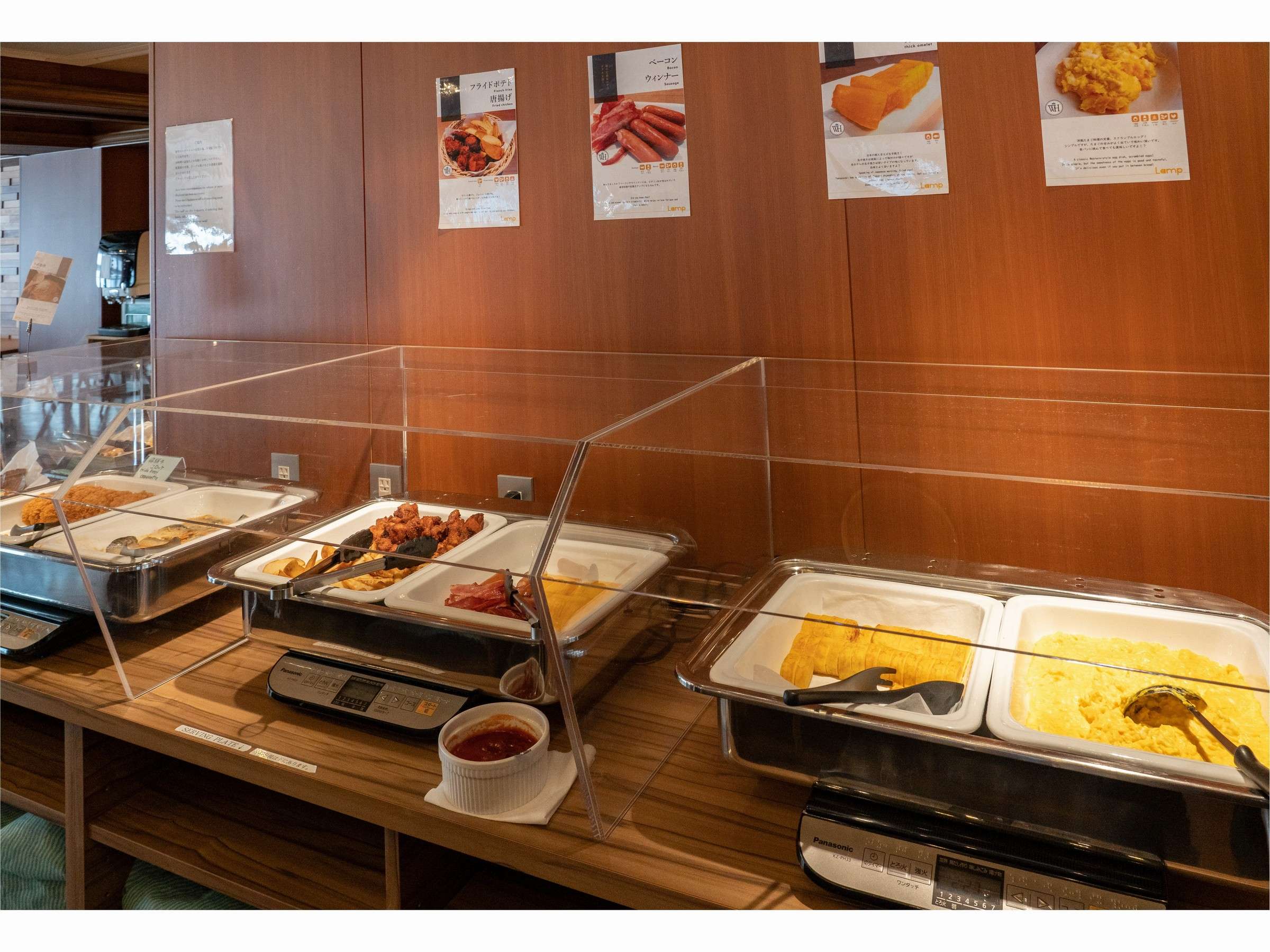 Japanese-style breakfast buffet spread at Wat Hotel & Spa Hida Takayama with hot dishes in warming trays