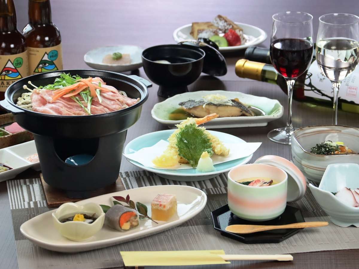 Multi-course Japanese kaiseki dinner with a tabletop hotpot, sashimi and grilled fish at Hotel Cerulean Alpen