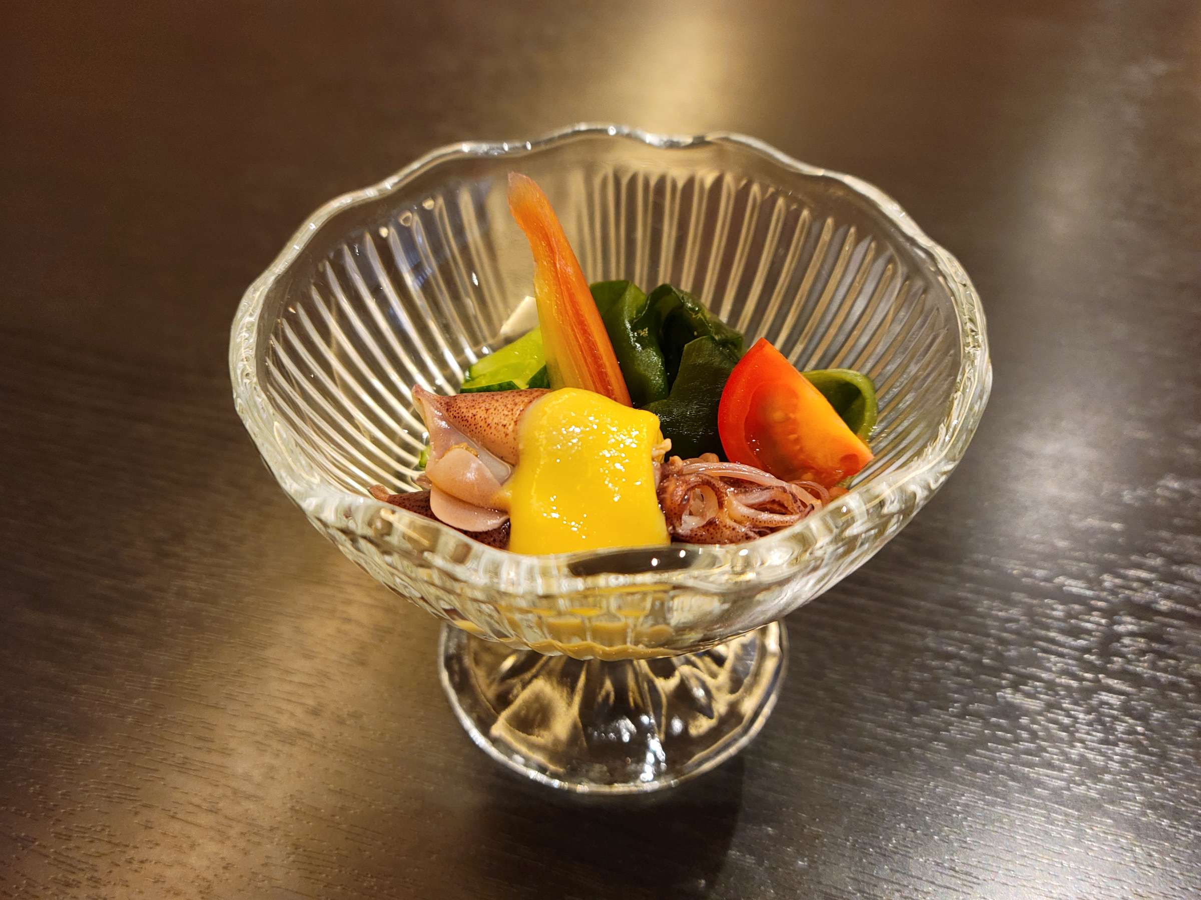 Kaiseki appetizer of squid and seasonal vegetables served in a fluted glass dish, Tsukimotoya, Kinosaki Onsen