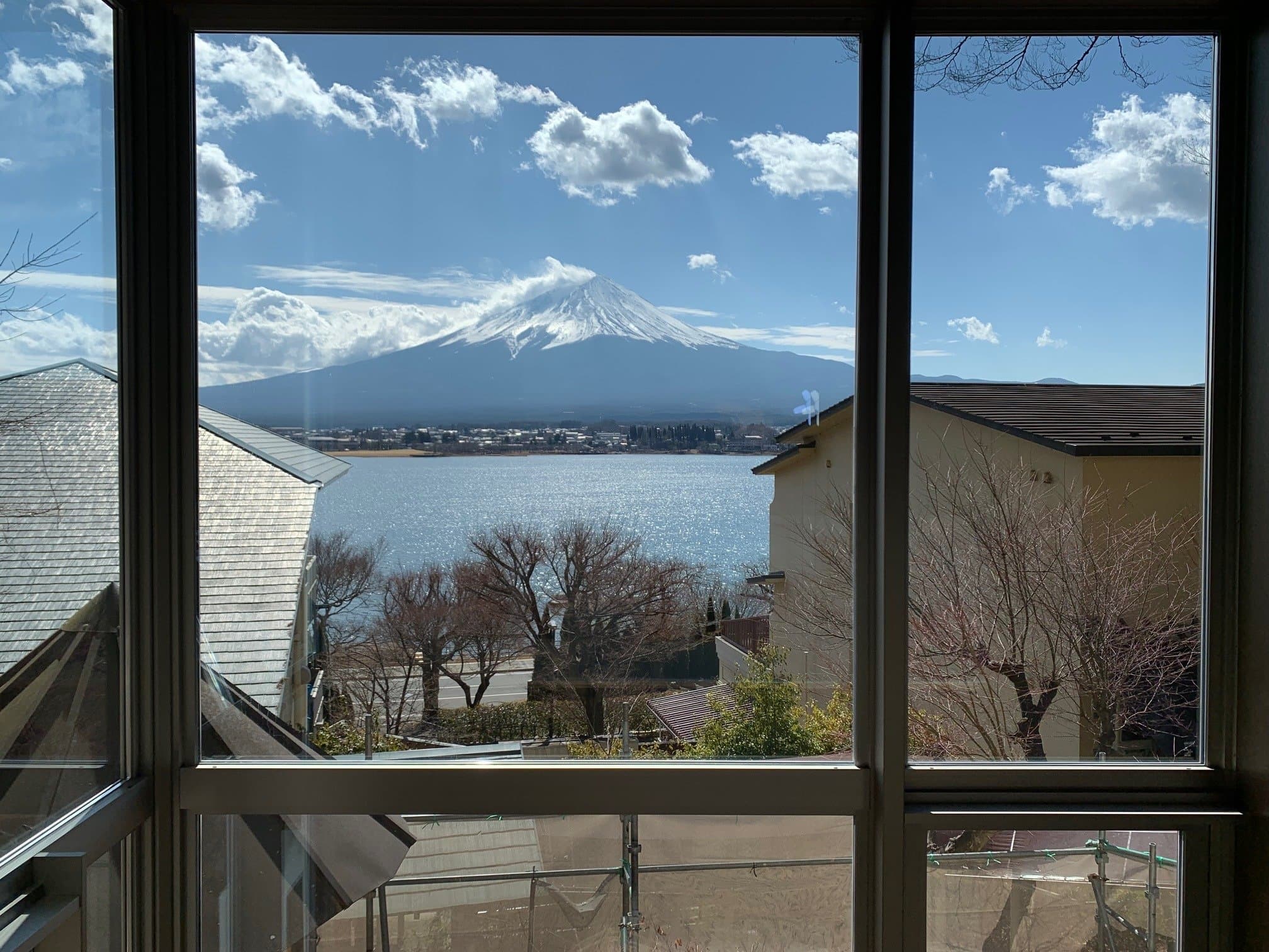 Mt Fuji viewed across Lake Kawaguchiko through a guest-room window at Sunnide Resort