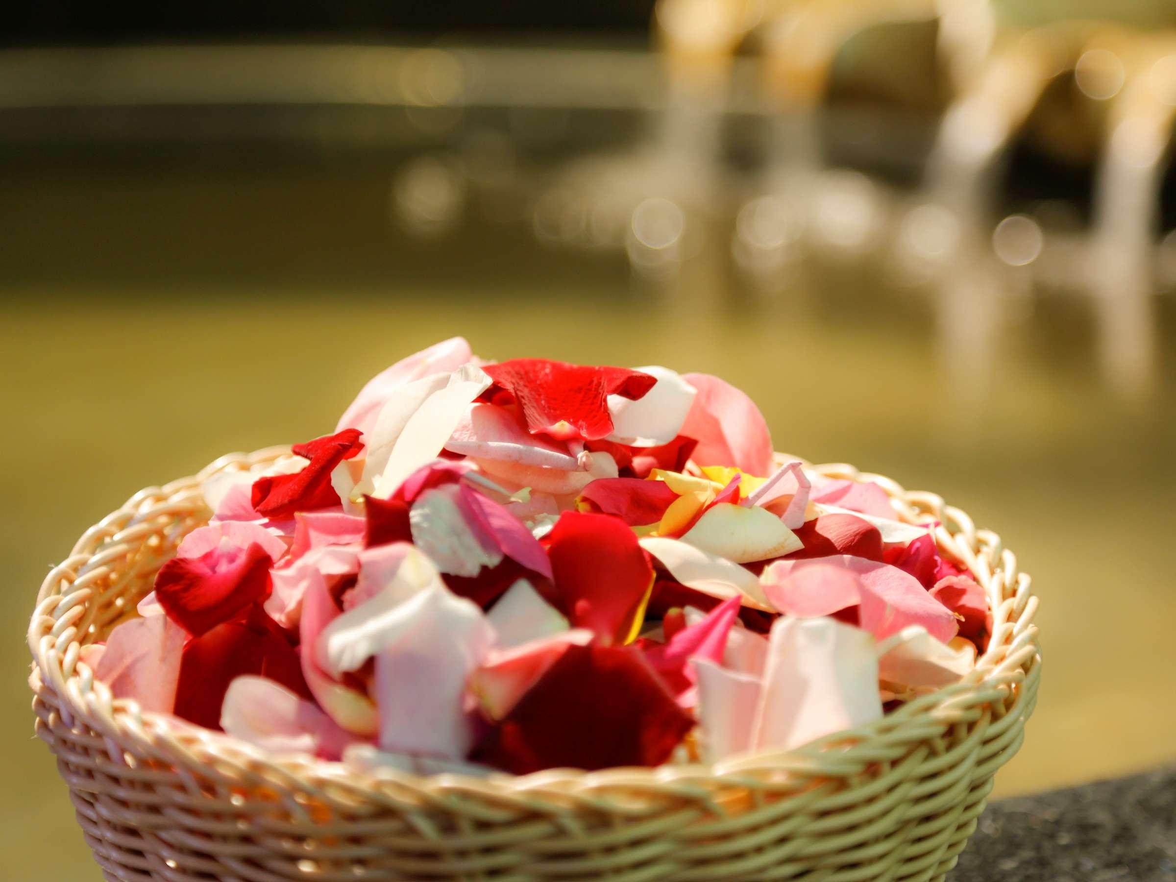 Yumekoyado Tenbouen Kinosaki Onsen basket of rose petals beside the bath as a welcome touch