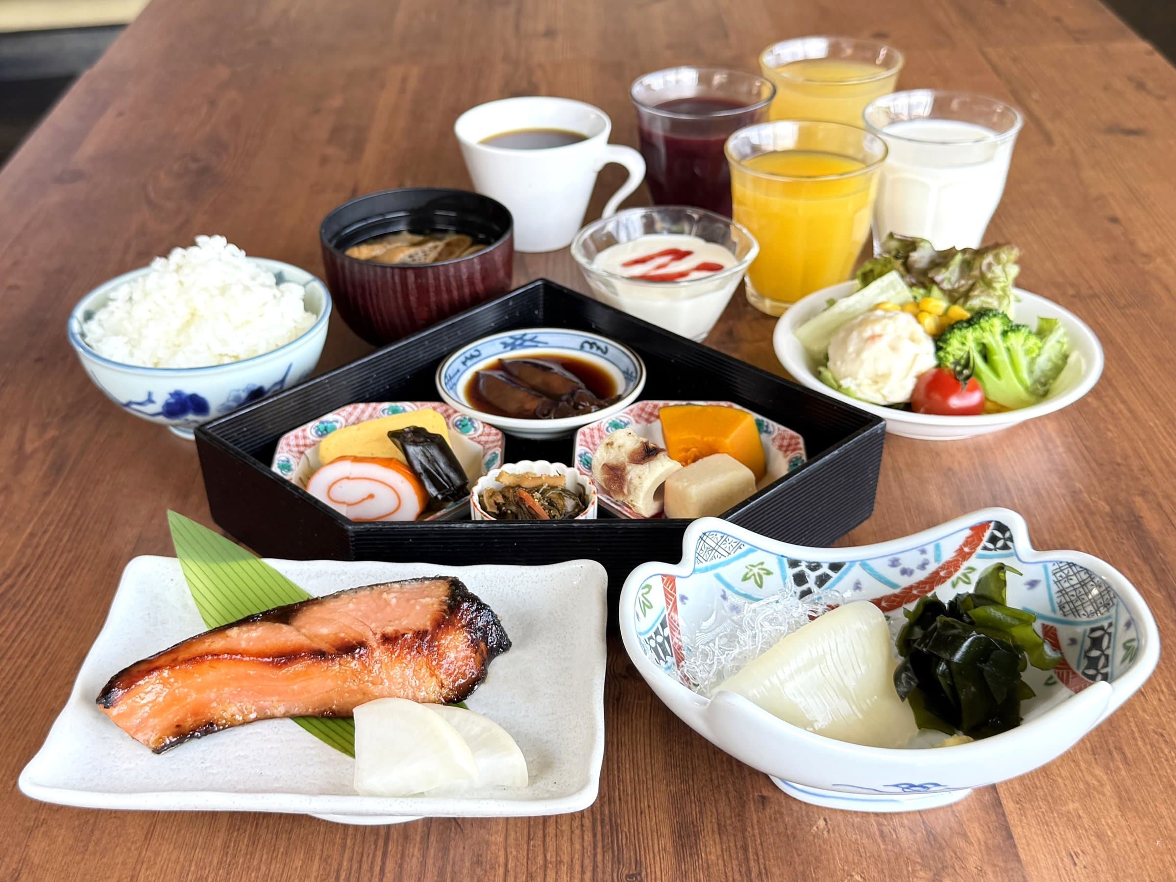 Japanese breakfast set with grilled salmon, rice, miso soup and side dishes at Kanazawa Manten Hotel Ekimae