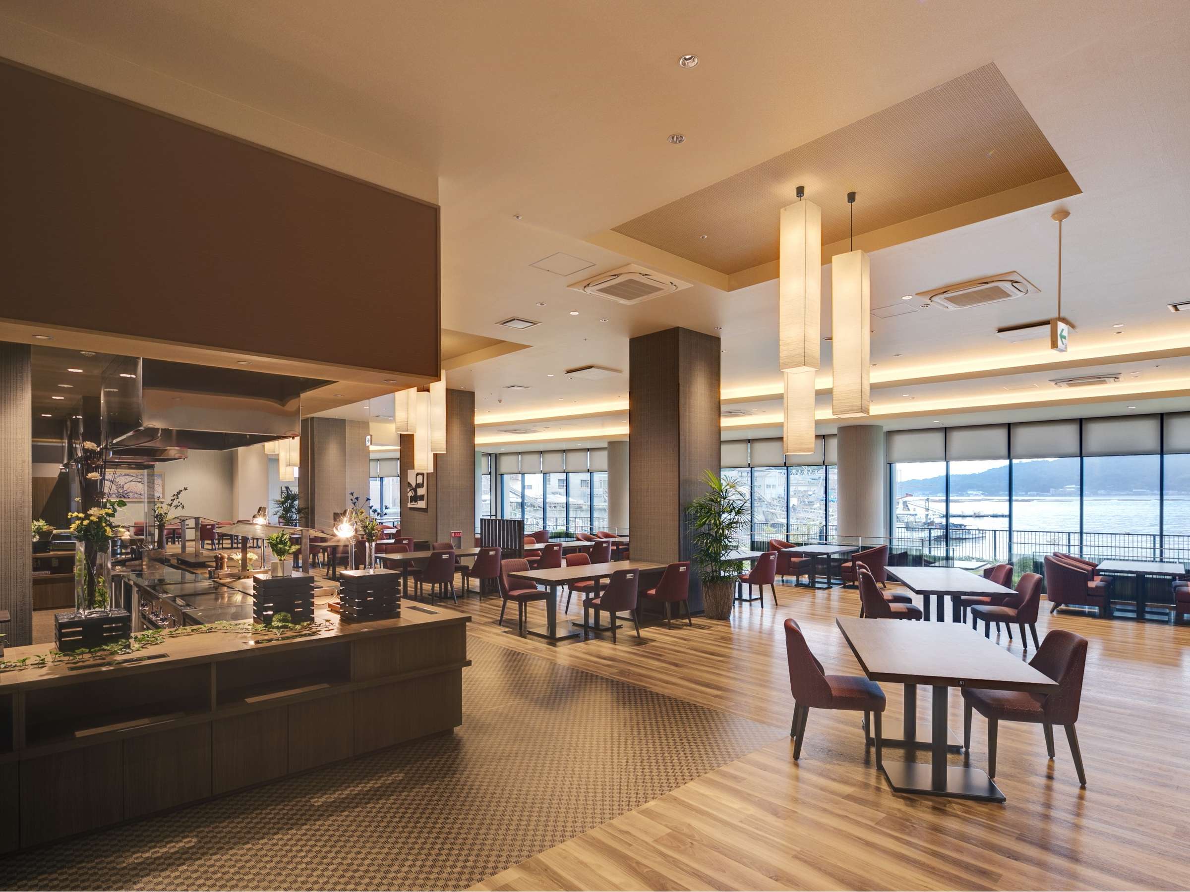 Seaside dining restaurant Miyajima Hakkei with open buffet station and sea-view windows