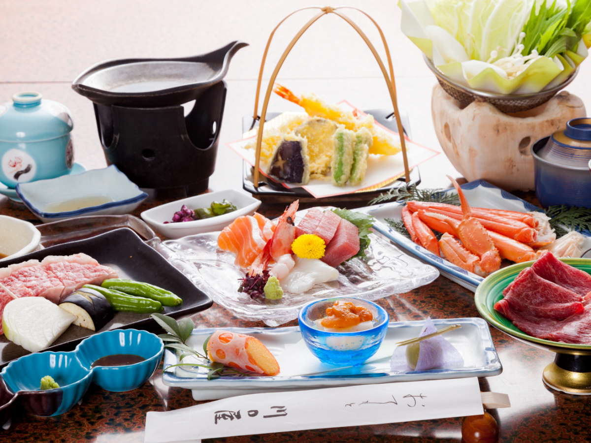 Kaiseki dinner spread with sashimi, snow crab, tempura and wagyu hotpot, Kawaguchiya Honkan, Kinosaki Onsen