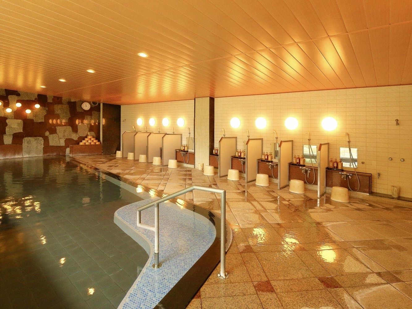 Private terrace bath with a deep ceramic tub and wooden lounge chair at dusk, Bosenkan, Gero Onsen