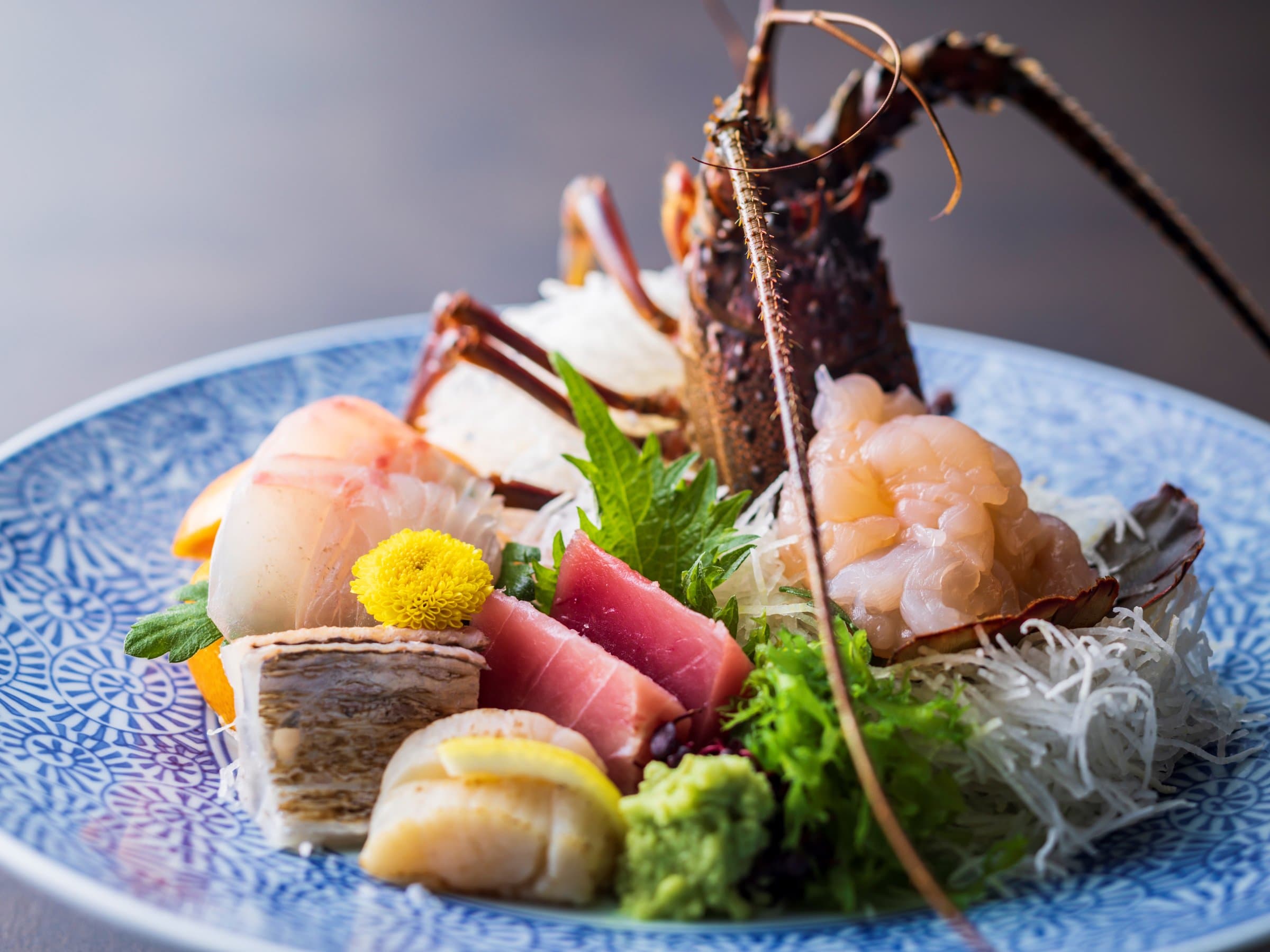 Kaiseki spiny lobster and seasonal sashimi platter served at Inatori Ginsuiso, Izu