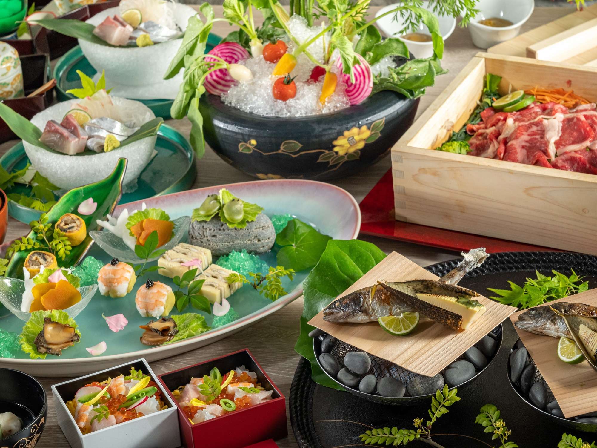 Multi-course kaiseki dinner spread at Unzen Azumaen with sashimi, simmered dishes and grilled fish
