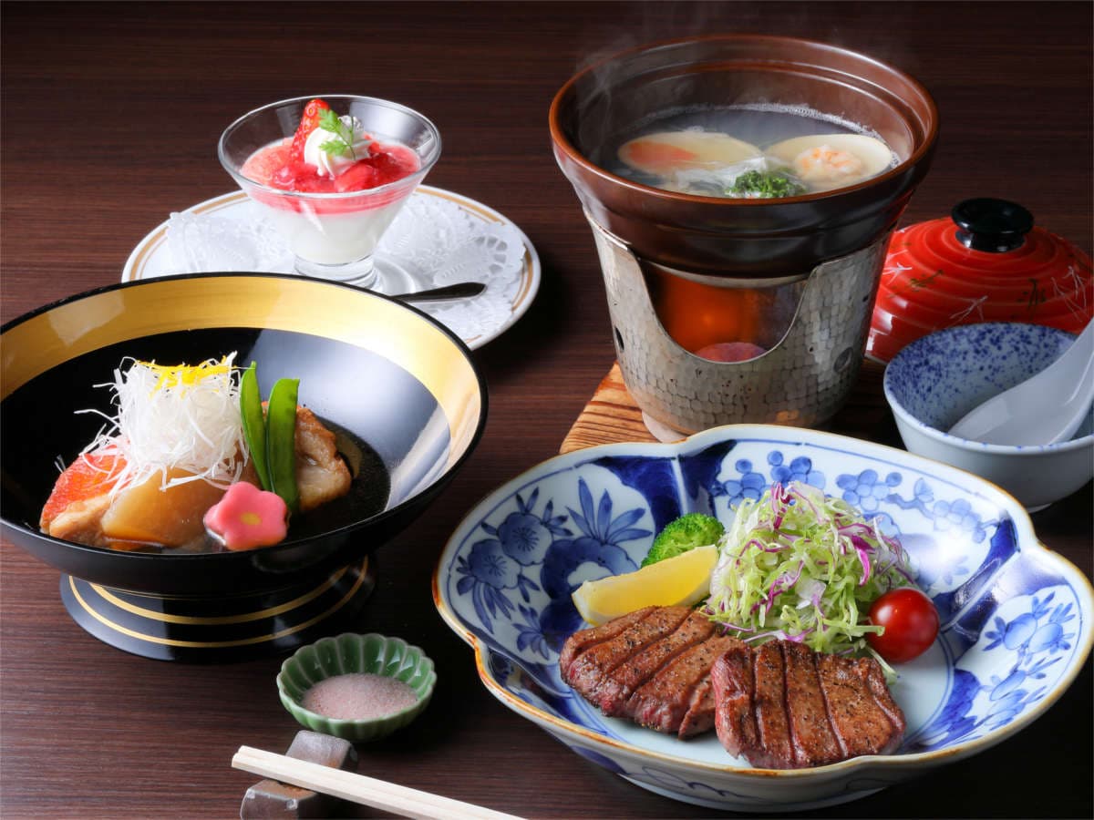 Kaiseki dinner set with simmered fish, grilled wagyu beef and a steaming hotpot served at Hotel New Mitoya, Akiu Onsen