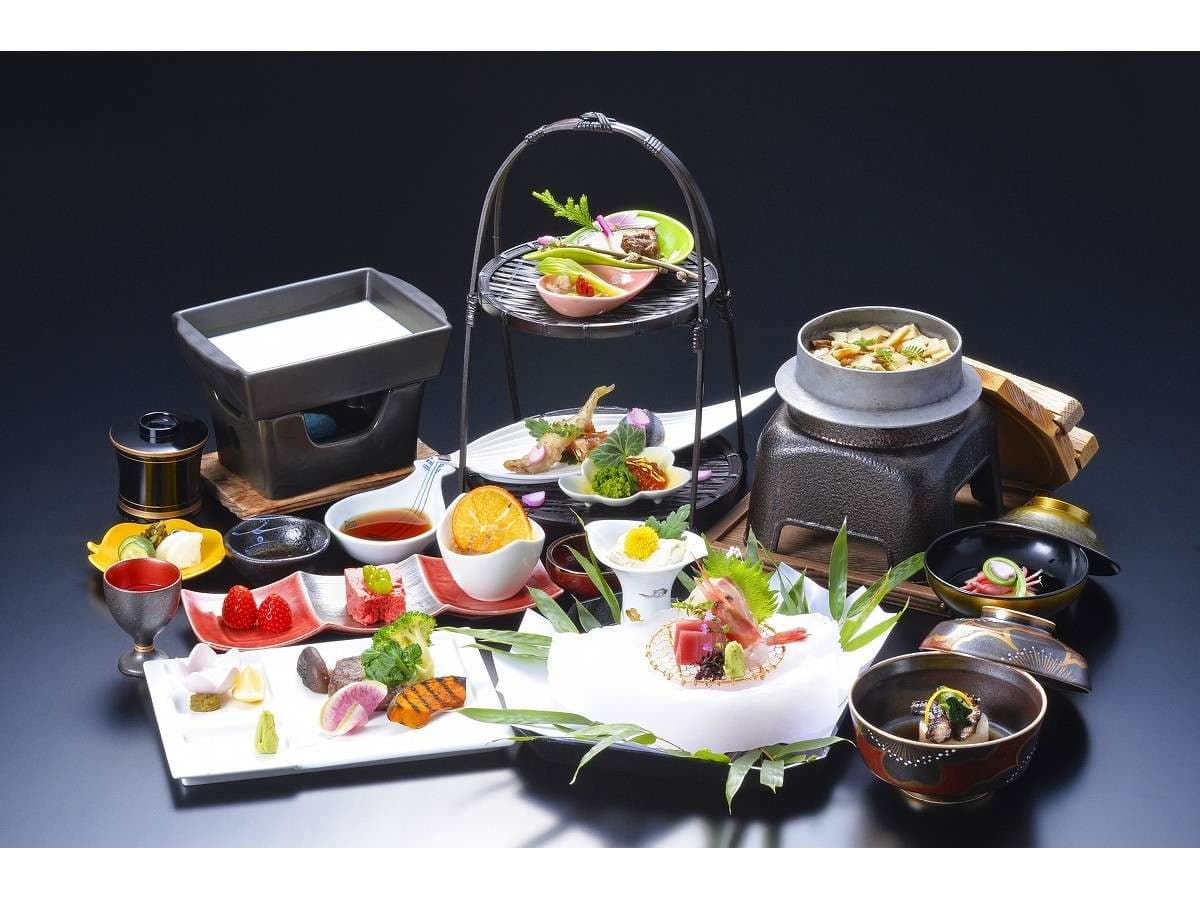 Multi-course yuba kaiseki dinner at Nikko Hoshi no Yado with sashimi, simmered dishes and tabletop hotpot