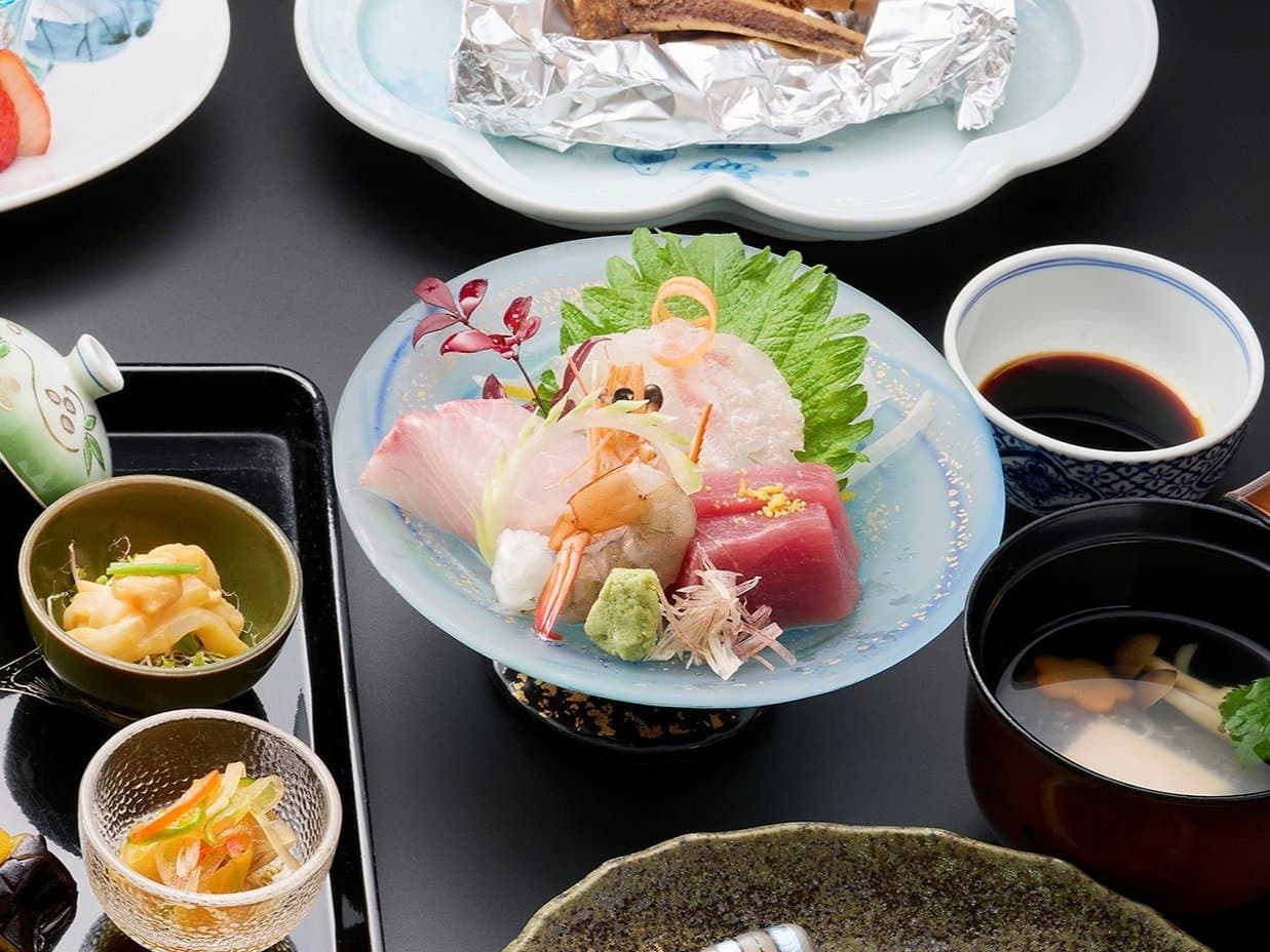 Fresh local sashimi course with shrimp and tuna at Ryokan Tsukimiso in Ibusuki