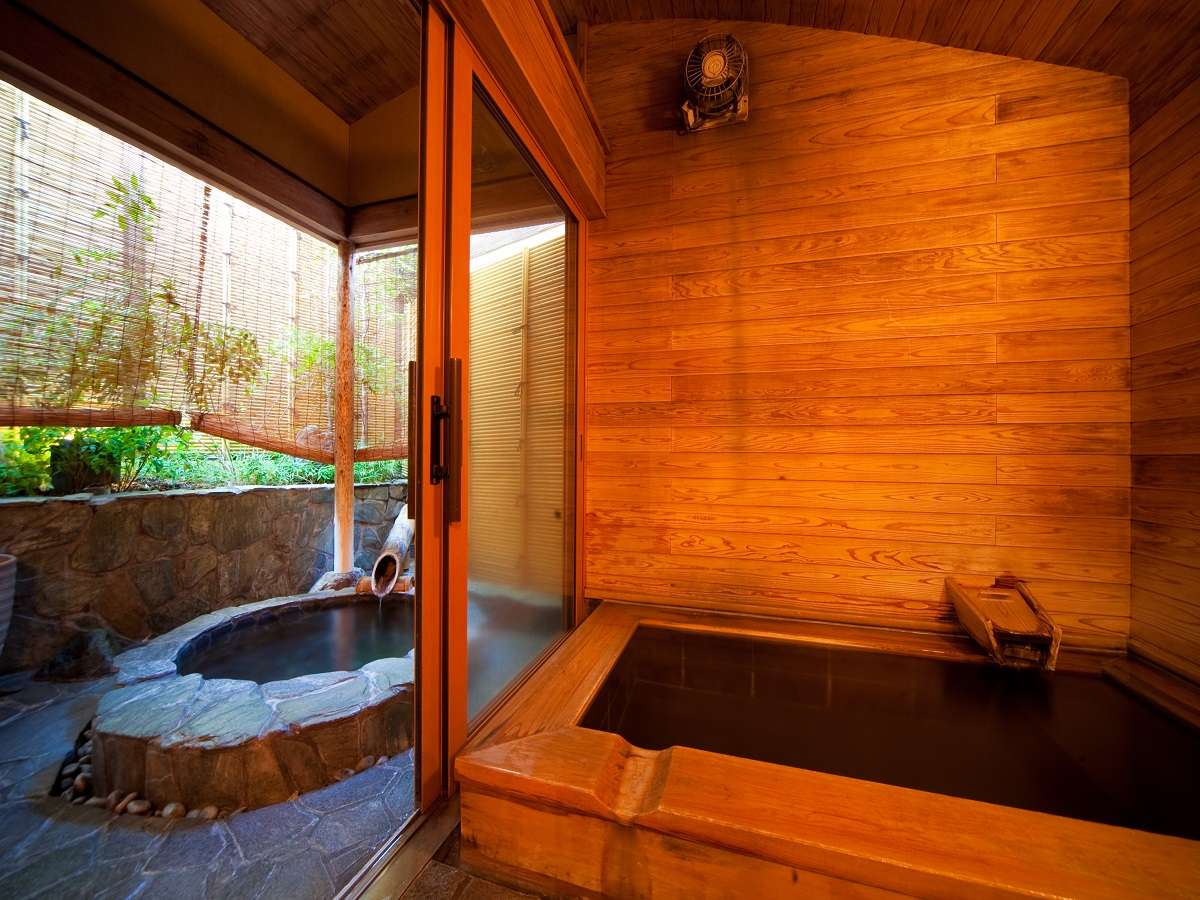 Private reservable cypress bath combining an indoor tub and semi-open-air section for intimate soaking, Ryokan Chobonoyado Shiori, Beppu Onsen