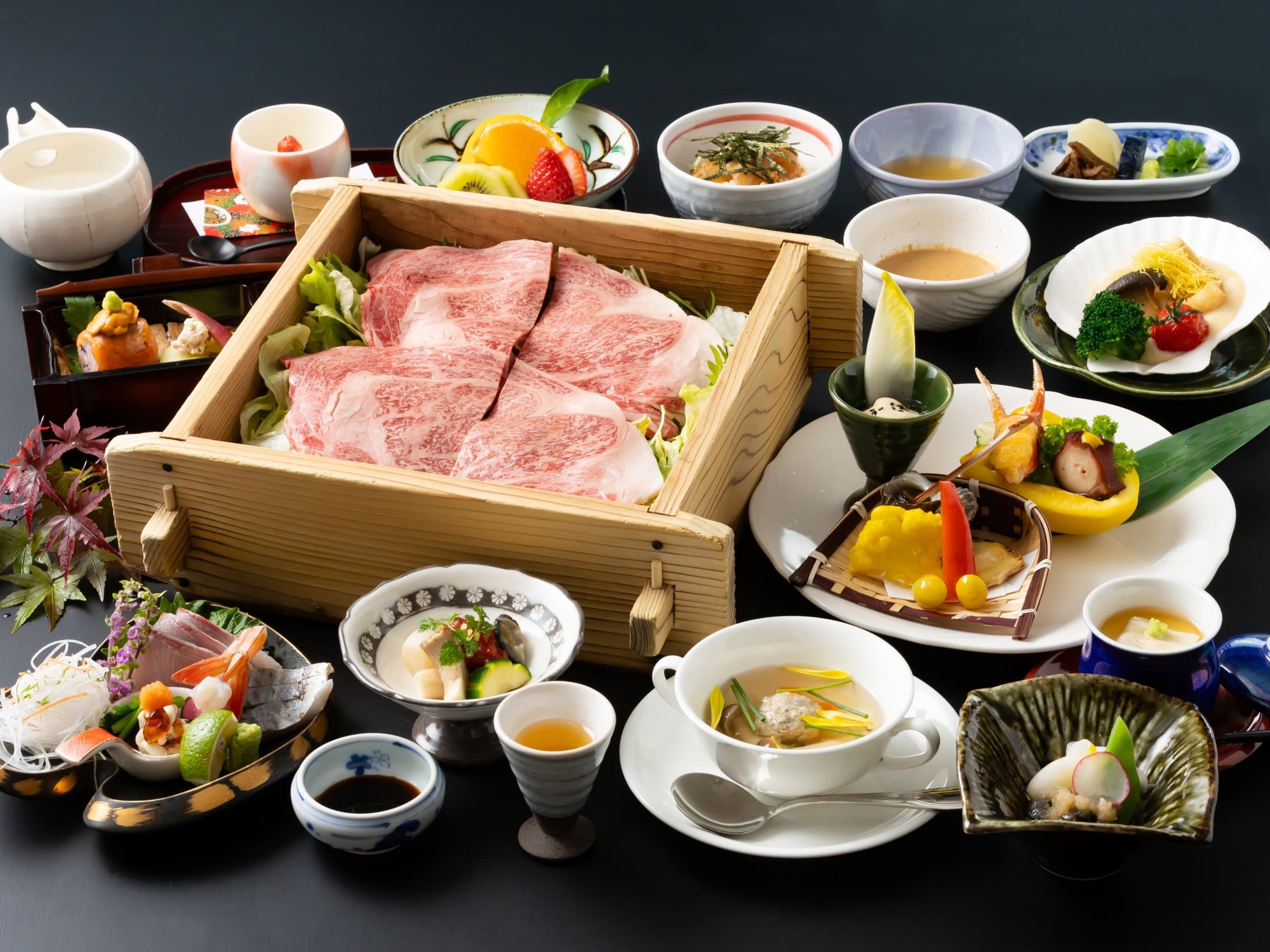 Multi-course kaiseki dinner featuring Oita wagyu beef steamed shabu and seasonal small dishes, Ryokan Chobonoyado Shiori, Beppu Onsen