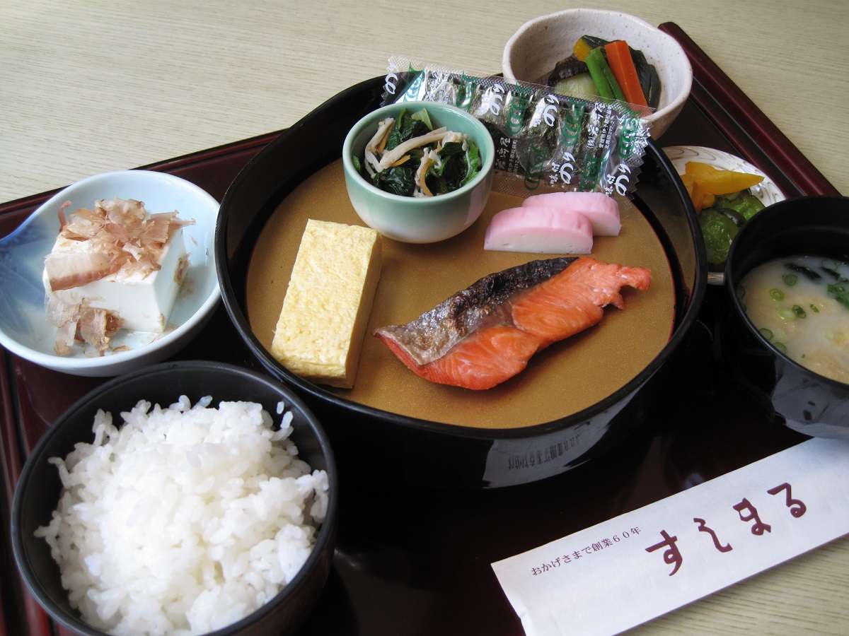 Japanese breakfast set with grilled salmon, tamagoyaki, rice and miso soup at Hotel Patio Dogo