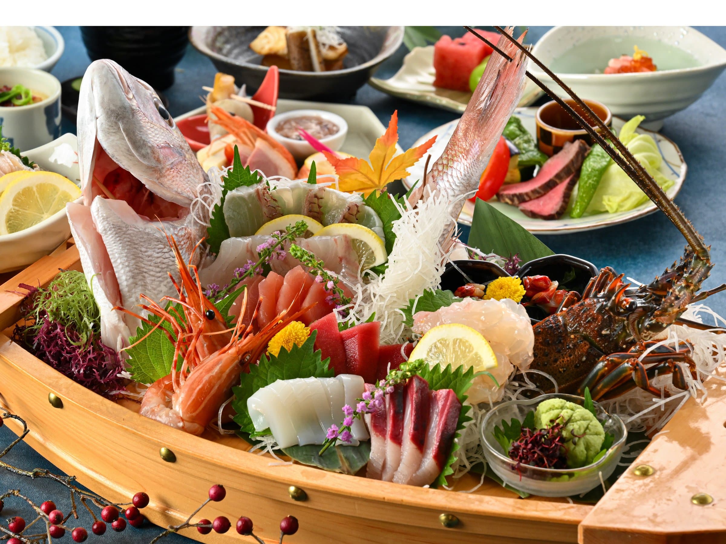 Signature seafood boat platter of sashimi, prawns and spiny lobster in Hamazuru's kaiseki dinner