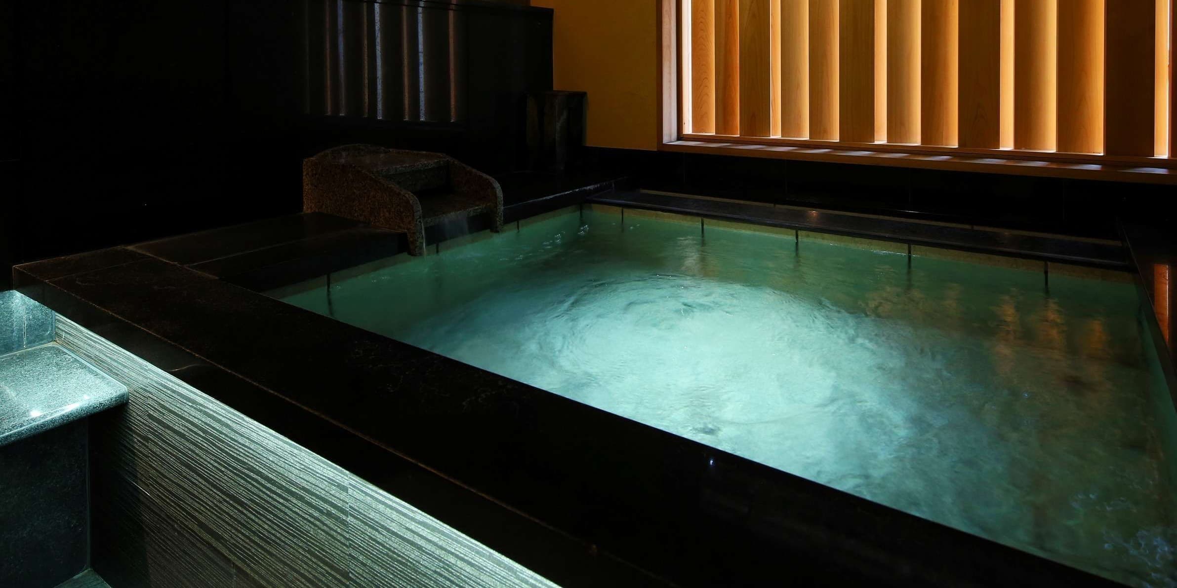 Yamazakura bath at Ichidaya with a calm hot-spring pool