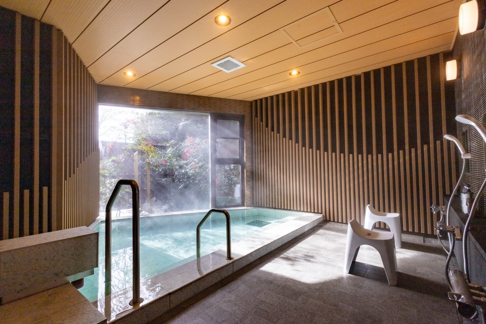 Private rental bath 'Akari' with stone surround at Senomoto Highland's Hotel
