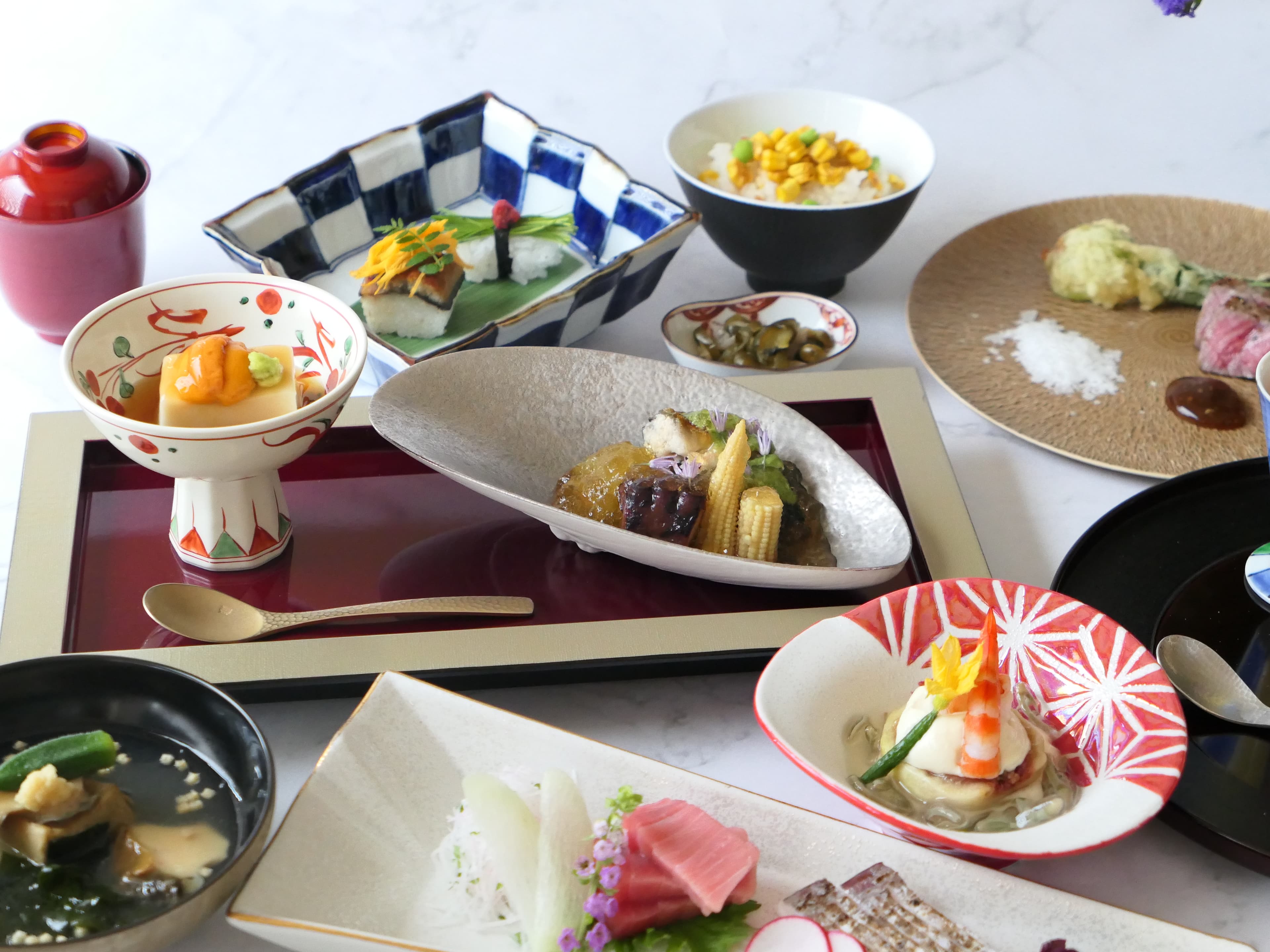 Multi-course Japanese kaiseki dinner with sashimi and seasonal dishes at Pearl Star Hotel Atami