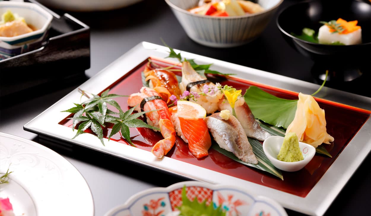 Plated sushi and Japanese set meal on a lacquered tray at Kanazawa Hakuchoro Hotel Sanraku