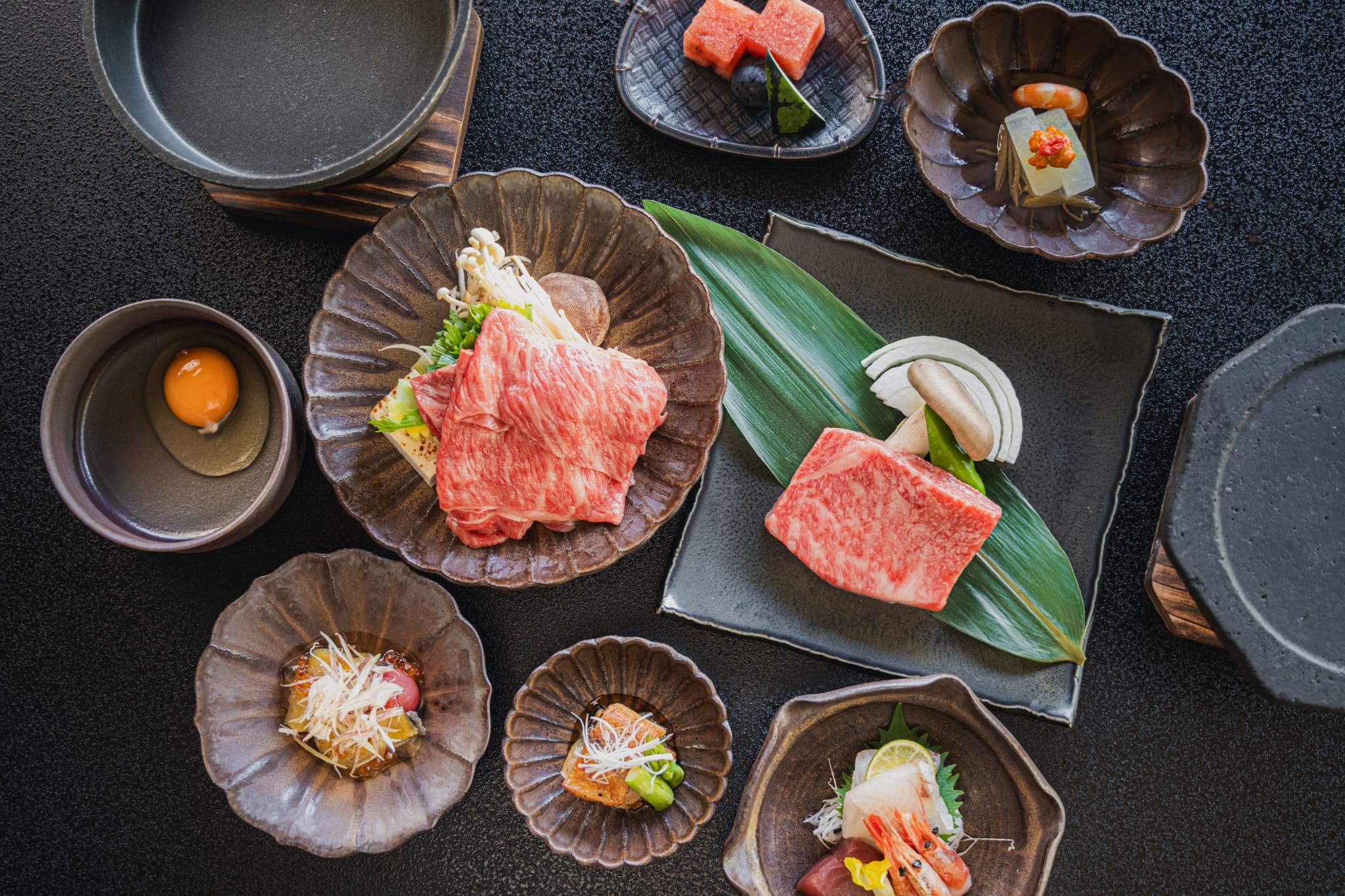 Multi-course kaiseki dinner spread served at Shinzan ryokan