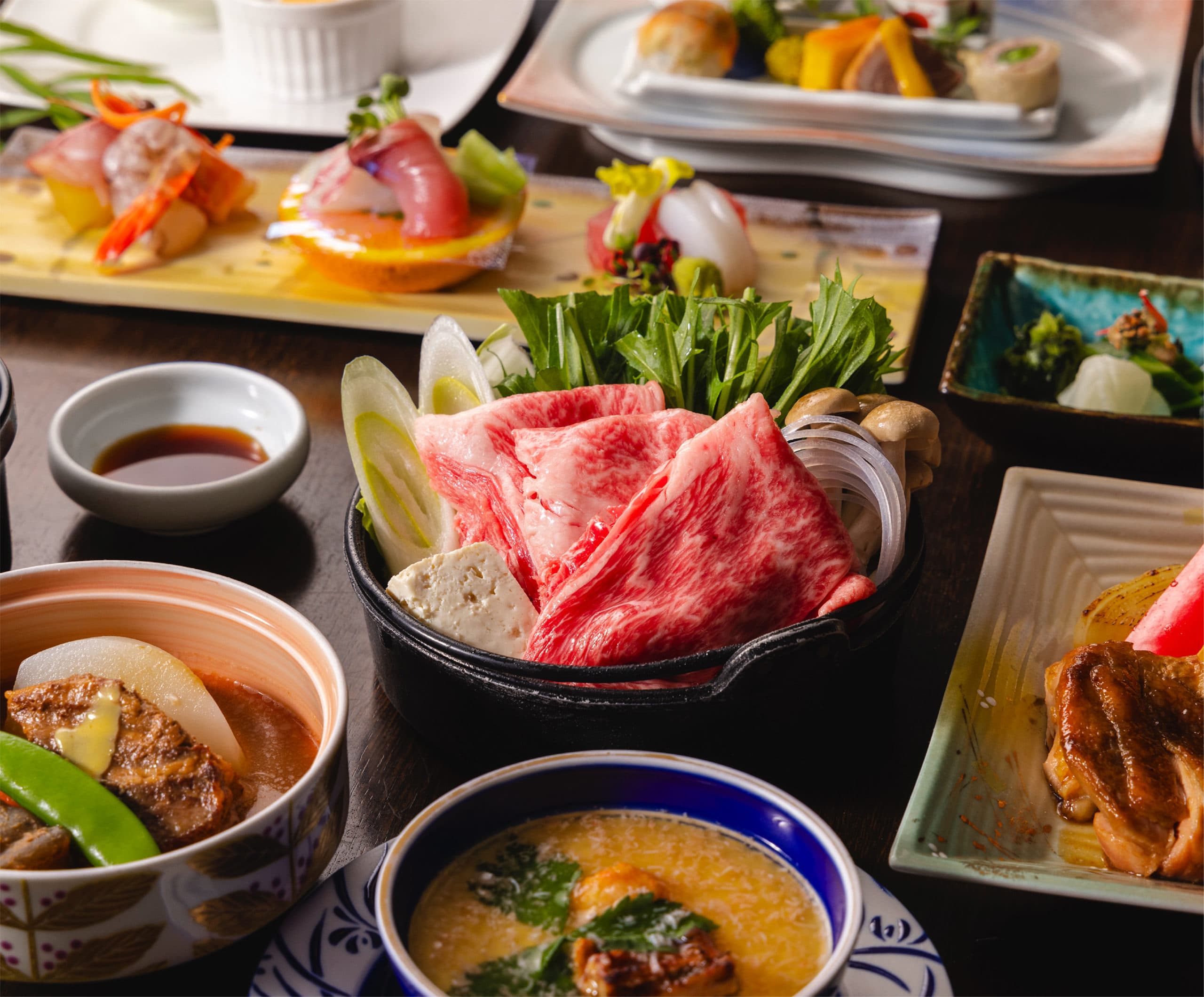 Kaiseki dinner spread with wagyu beef hotpot and assorted local dishes, Hotel Shougetsu Ibusuki