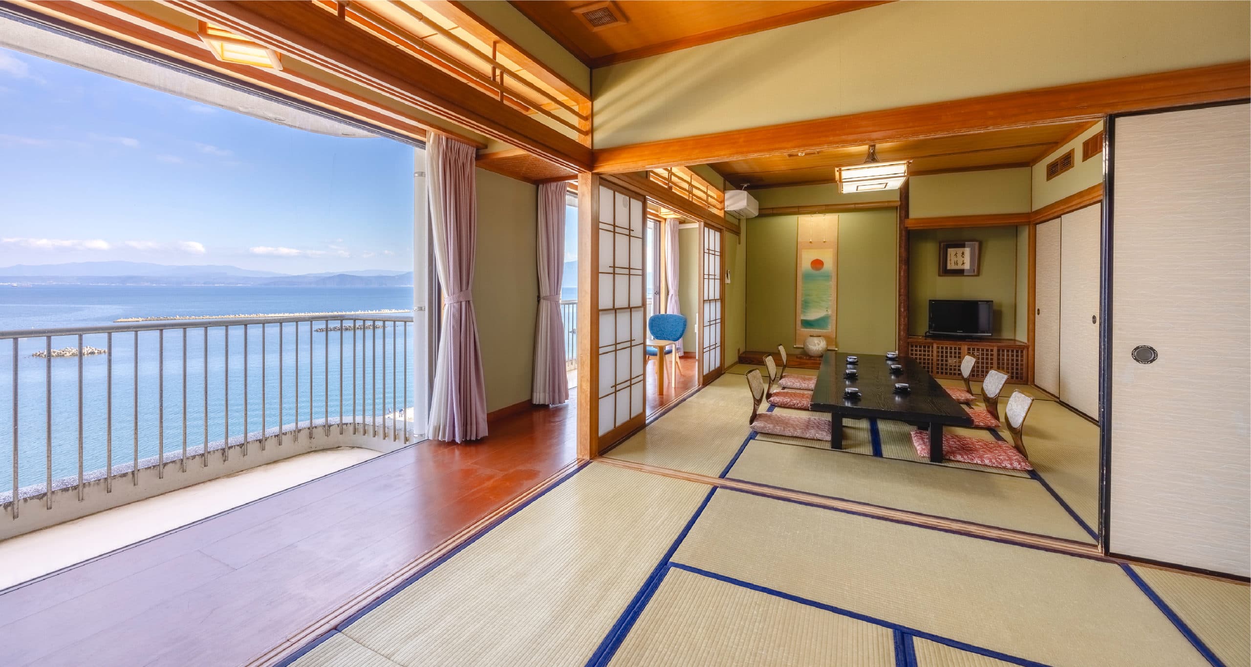 Spacious tatami suite with open balcony overlooking Kinko Bay, Hotel Shougetsu Ibusuki Onsen