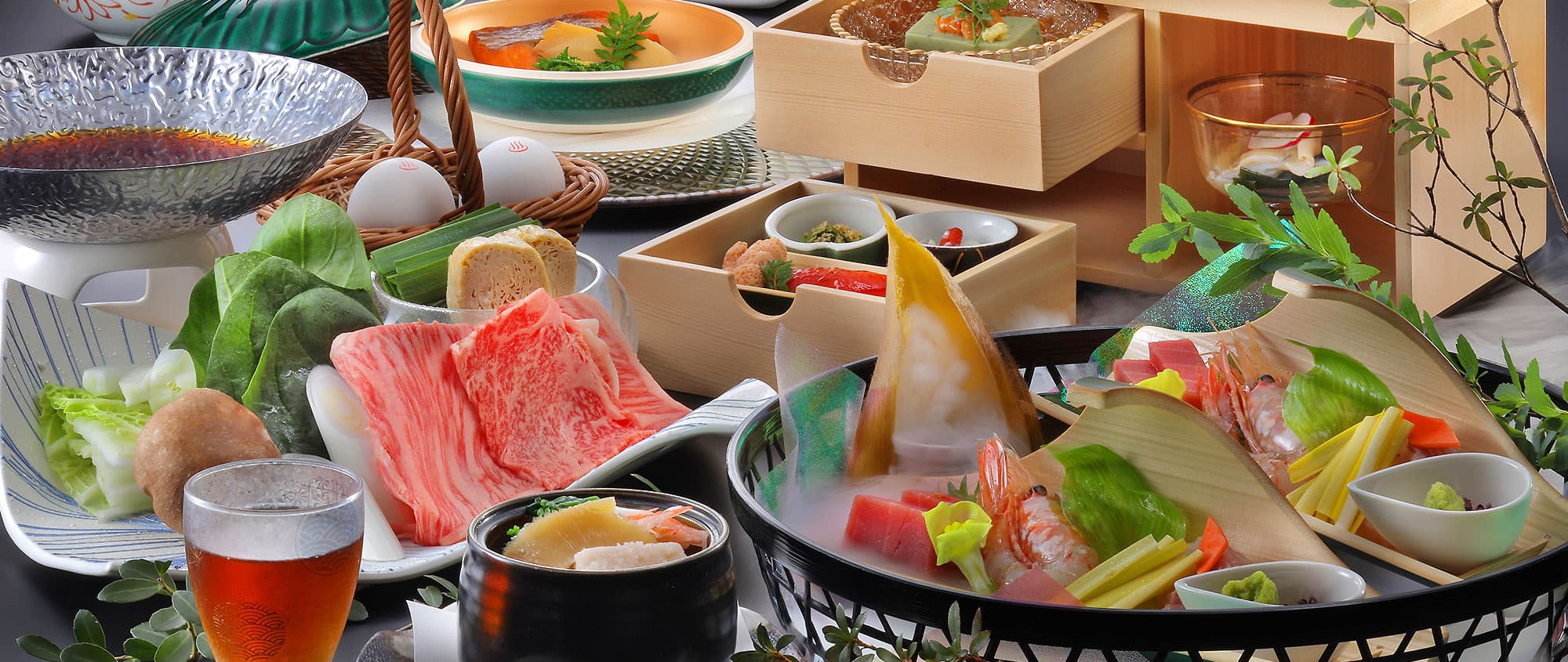 Kaiseki dinner spread at Hotel Tsuga no Ki featuring marbled Tochigi wagyu, sashimi and seasonal small dishes