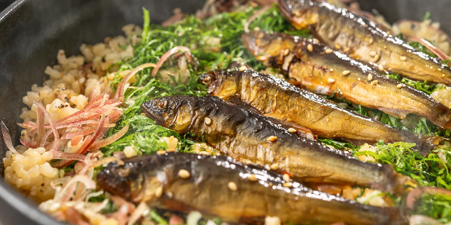 Grilled mountain-stream fish over seasoned rice with shredded ginger, a local Okunikko dish