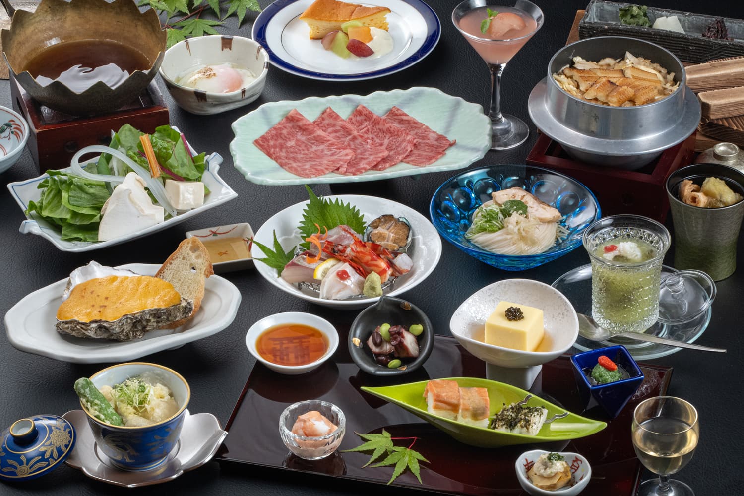 Kaiseki dinner spread at Kinsuikan featuring Hiroshima wagyu, sashimi and seasonal small dishes