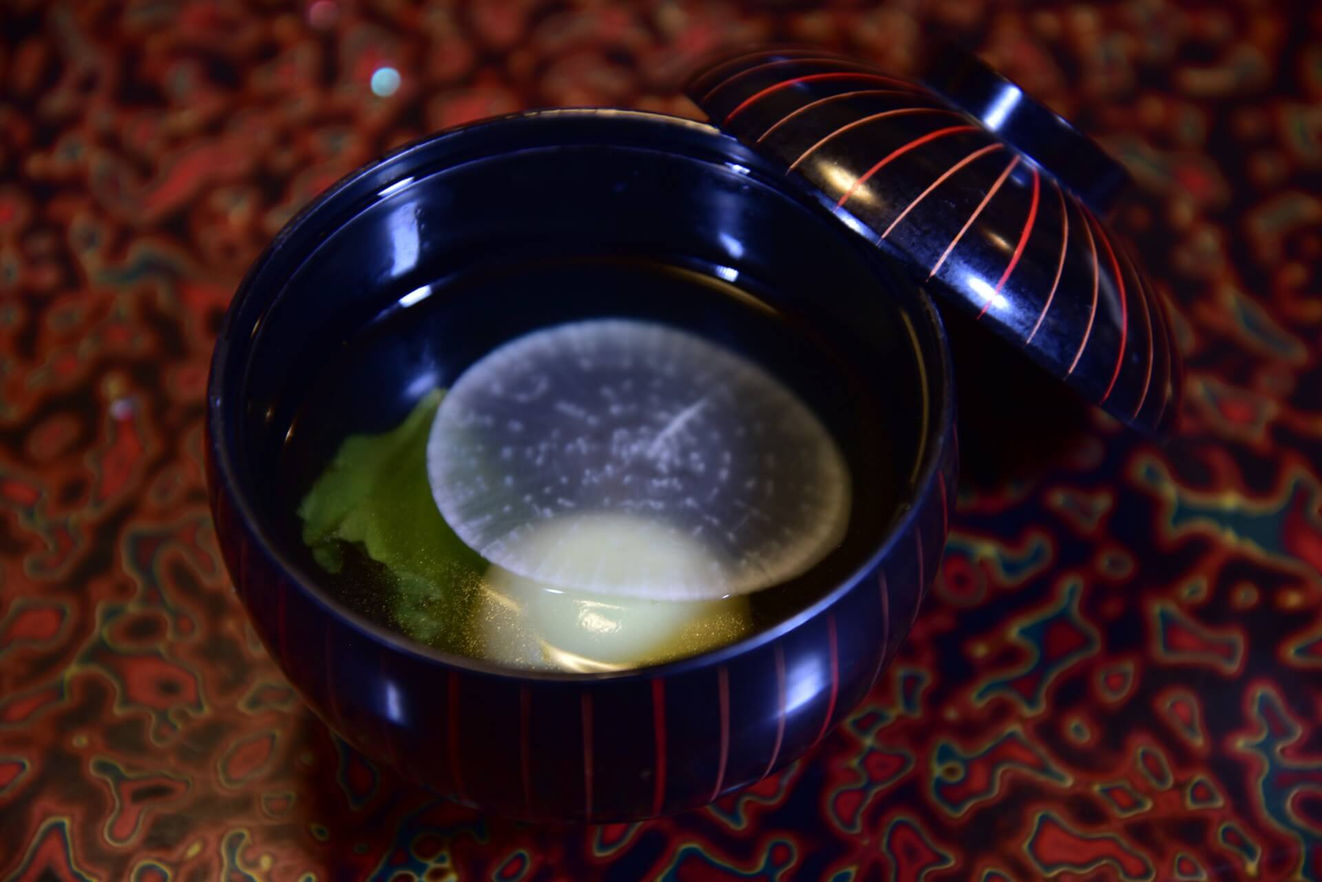 Seasonal kaiseki dish plated with local ingredients at Kounoyu