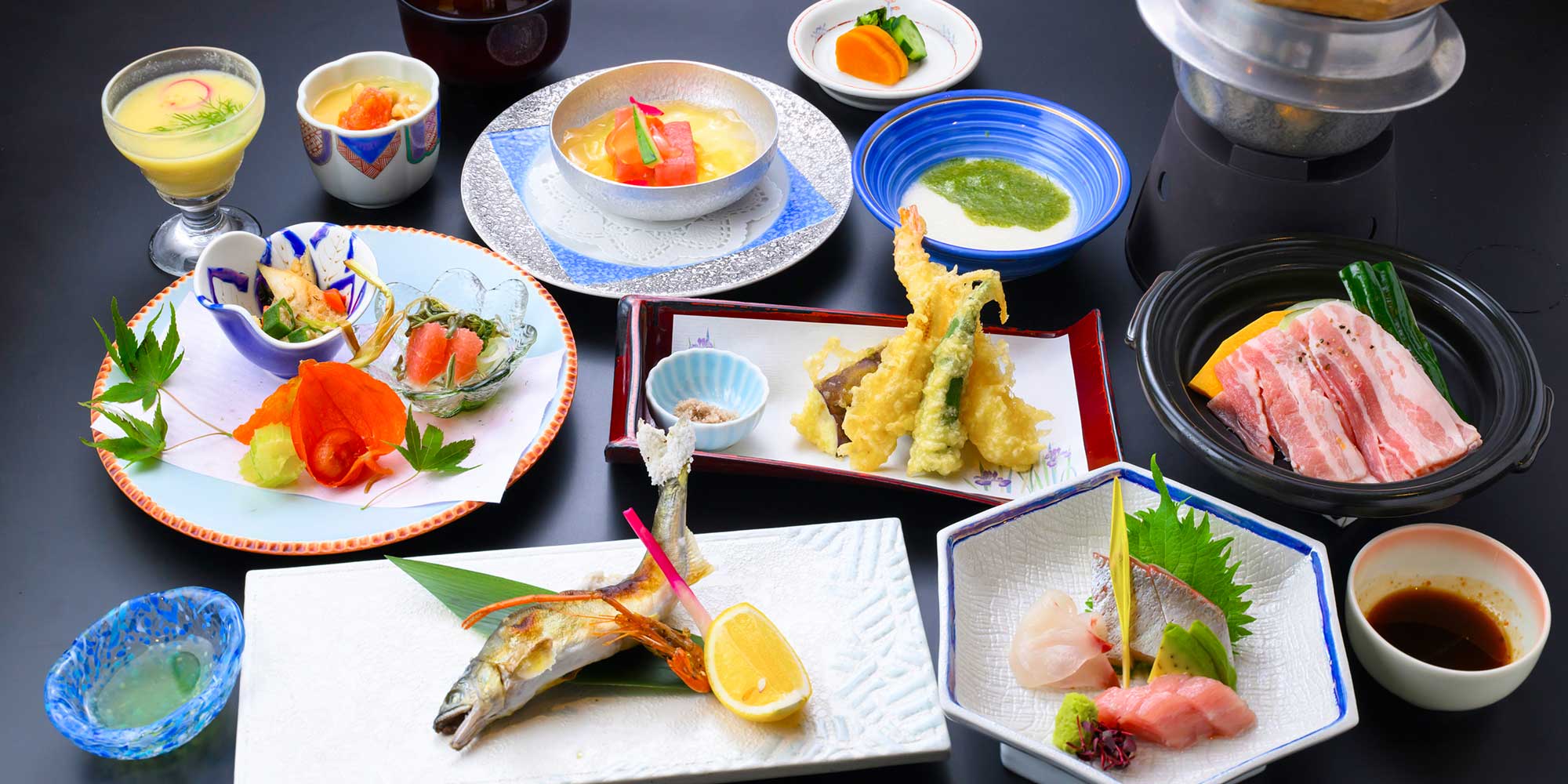 Multi-course kaiseki dinner at Nansuikaku with grilled fish, tempura, sashimi and seasonal small dishes