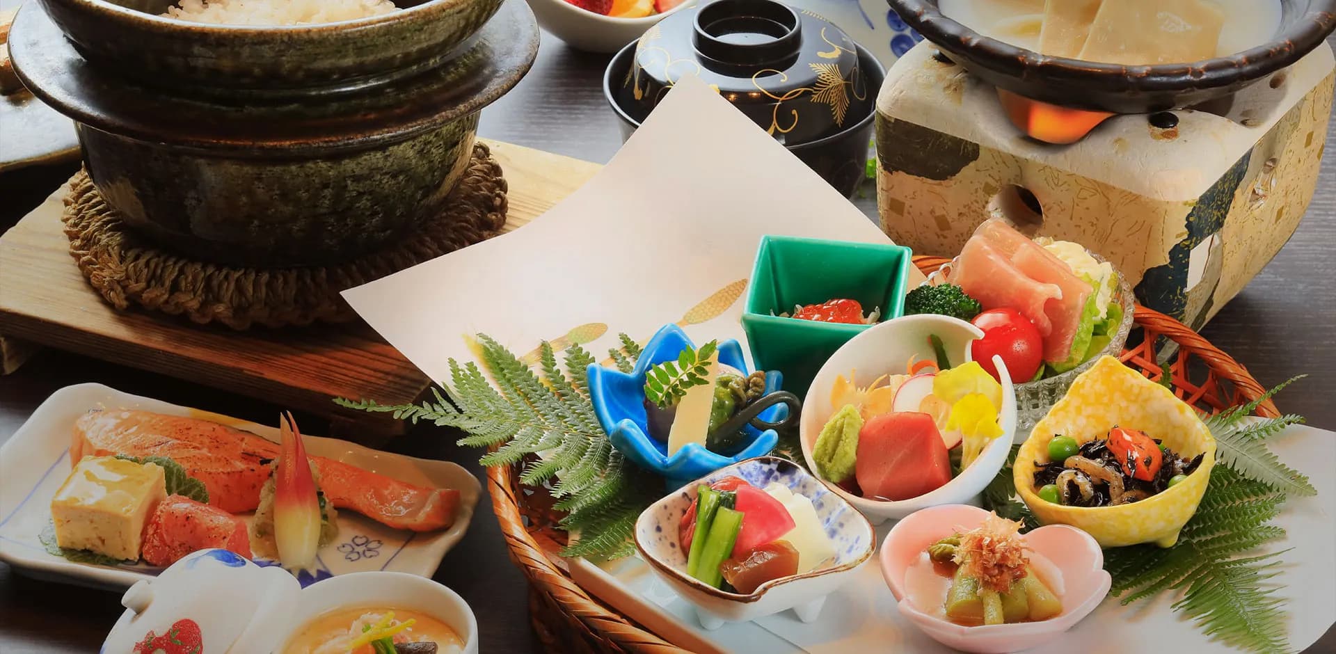 Kaiseki dinner course with a clay-pot dish and assorted small appetizers at Fuji Onsenji Yumedono