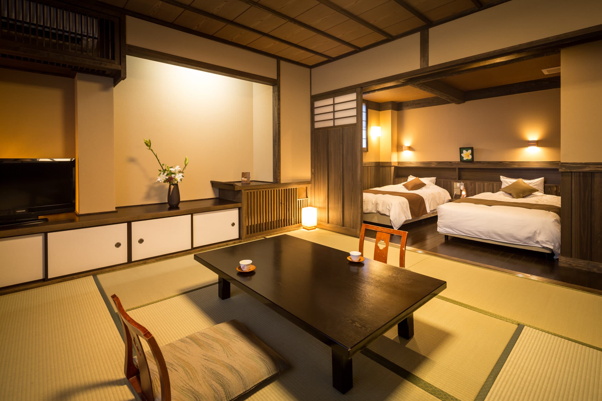 Ryokan Wakaba Satsuki tatami guest room with futon and low table