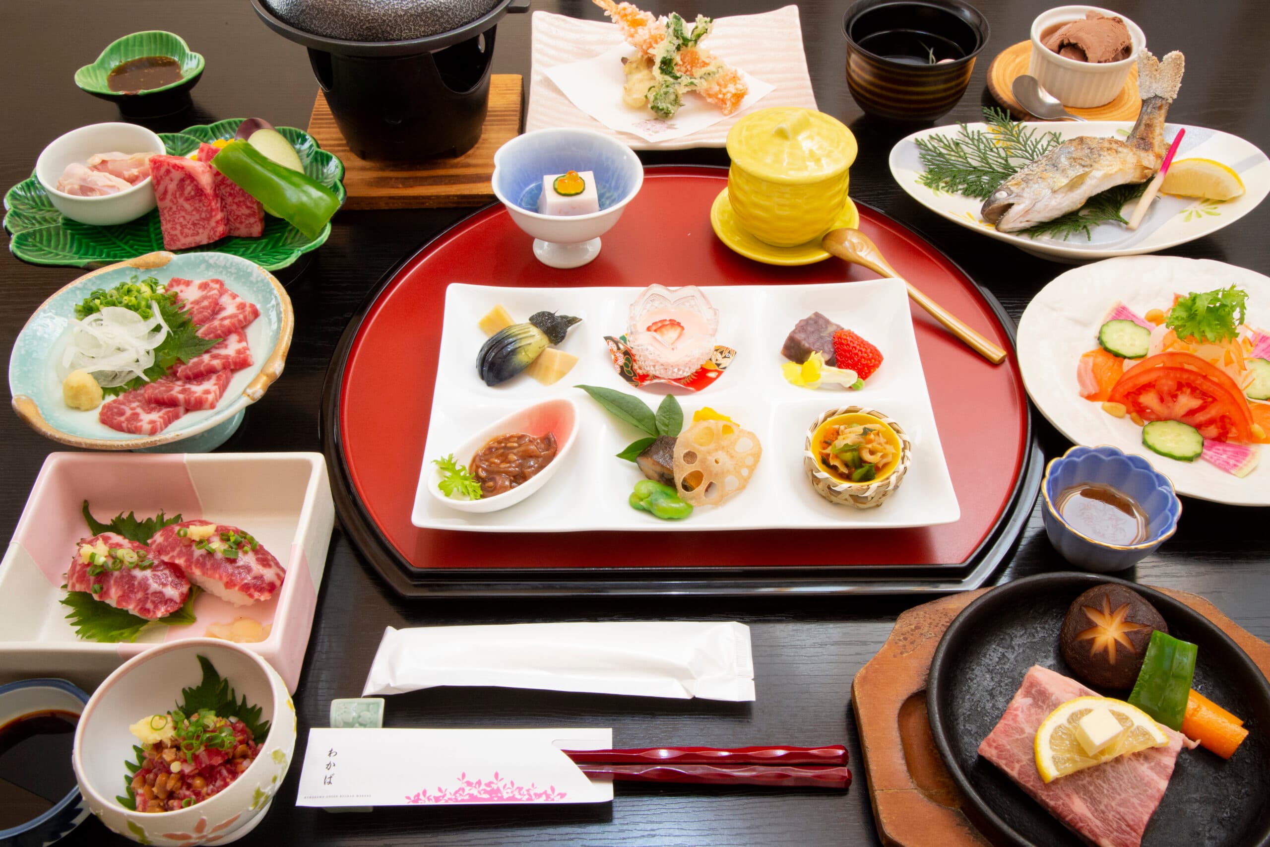 Ryokan Wakaba luxury multi-course kaiseki dinner spread with akaushi beef and horse sashimi