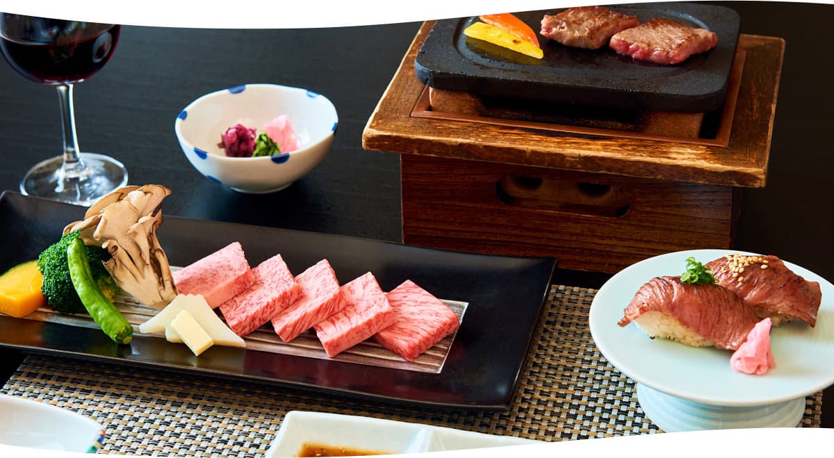 Kaiseki dinner at Kozantei Ubuya featuring grilled Koshu wagyu beef, sashimi-style nigiri and seasonal vegetables