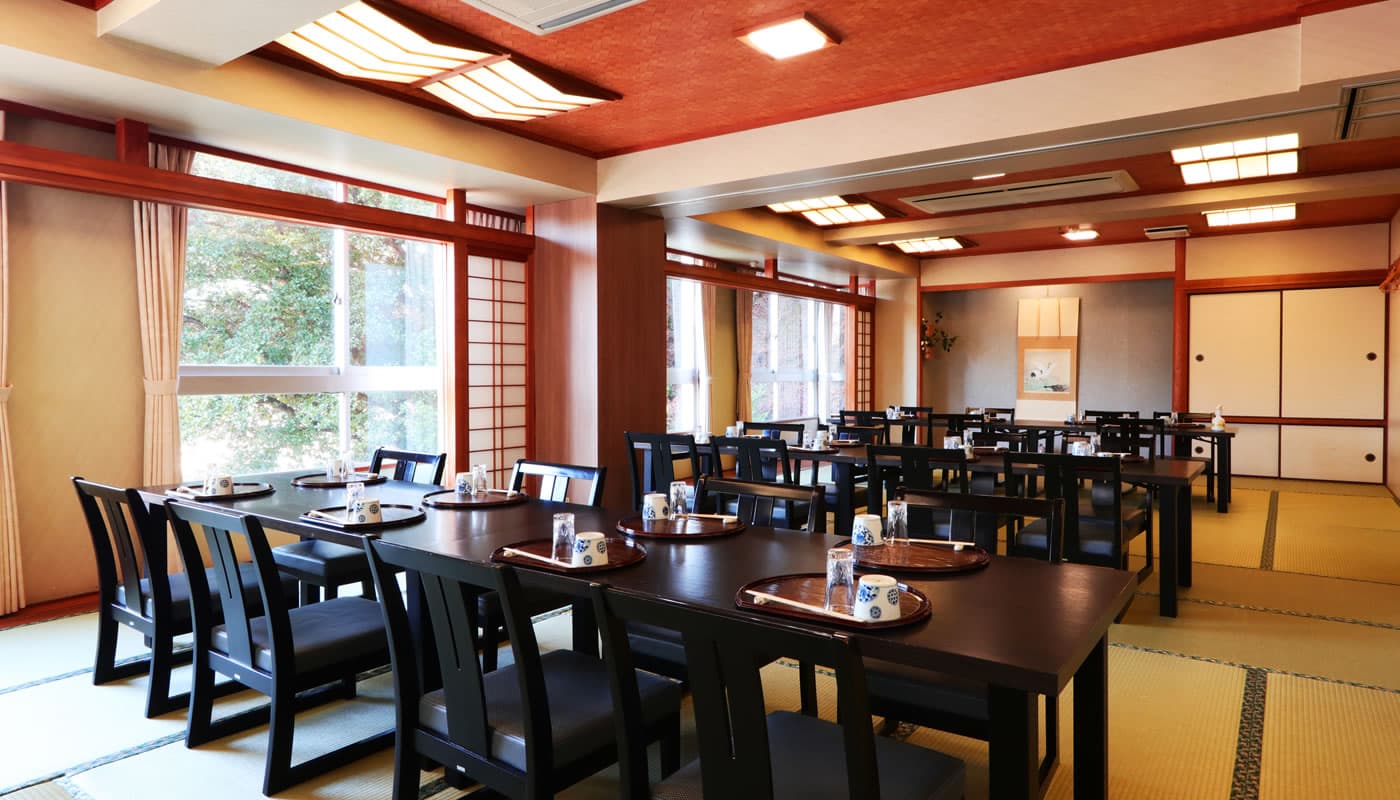 Japanese banquet dining hall with tatami floor and shoji screens at Yamaichi Bekkan, Miyajima